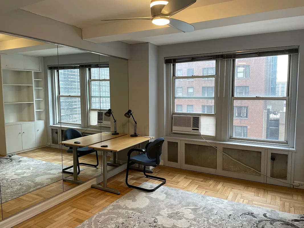 433 West 34th Street, Unit 7B Manhattan, NY 10001 - Photo 4 of 13 a workspace with pool table and windows