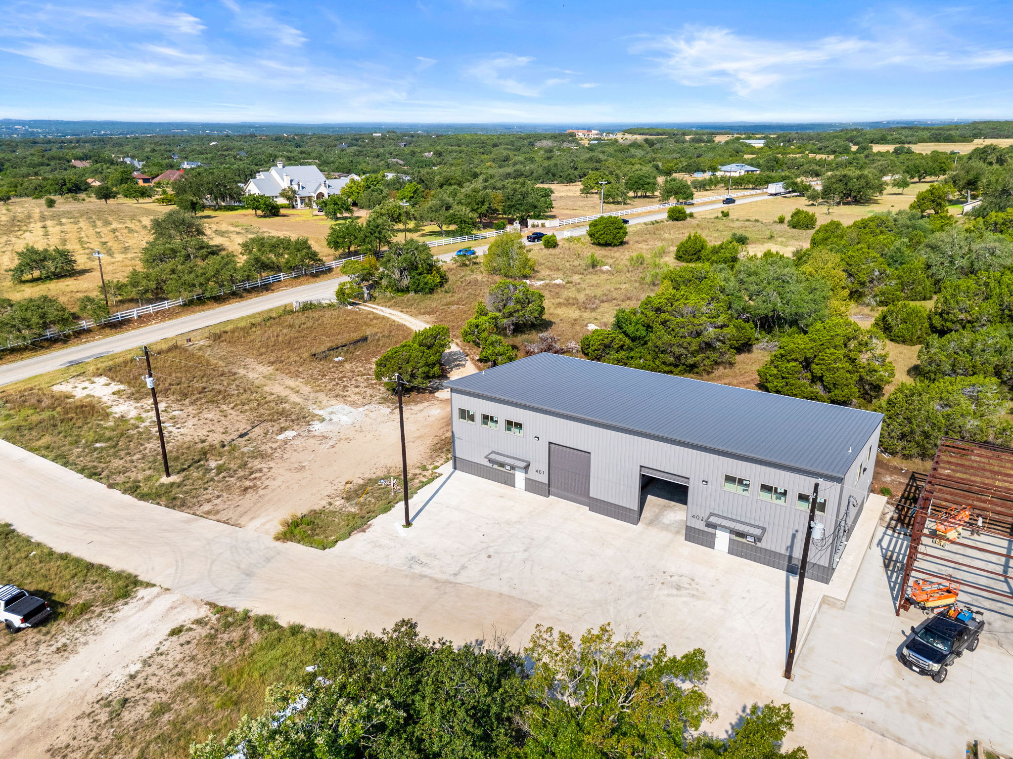 10020 Darden Hill Road, Unit 401 Austin, TX 78737 - Photo 49 of 50 a view of a city from a terrace