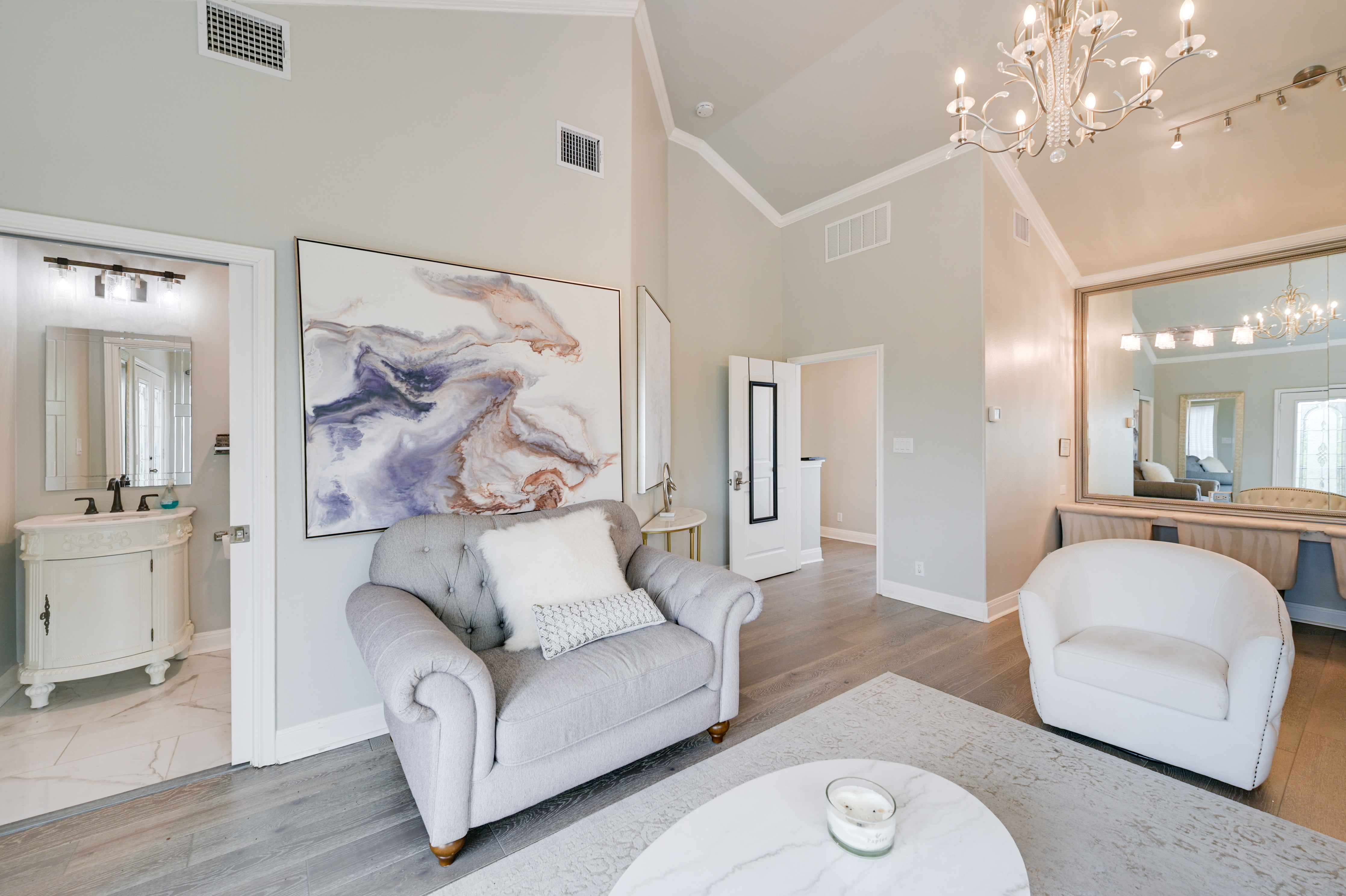14913 Murfin Road Austin, TX 78734 - Photo 39 of 40 a living room with furniture and a chandelier