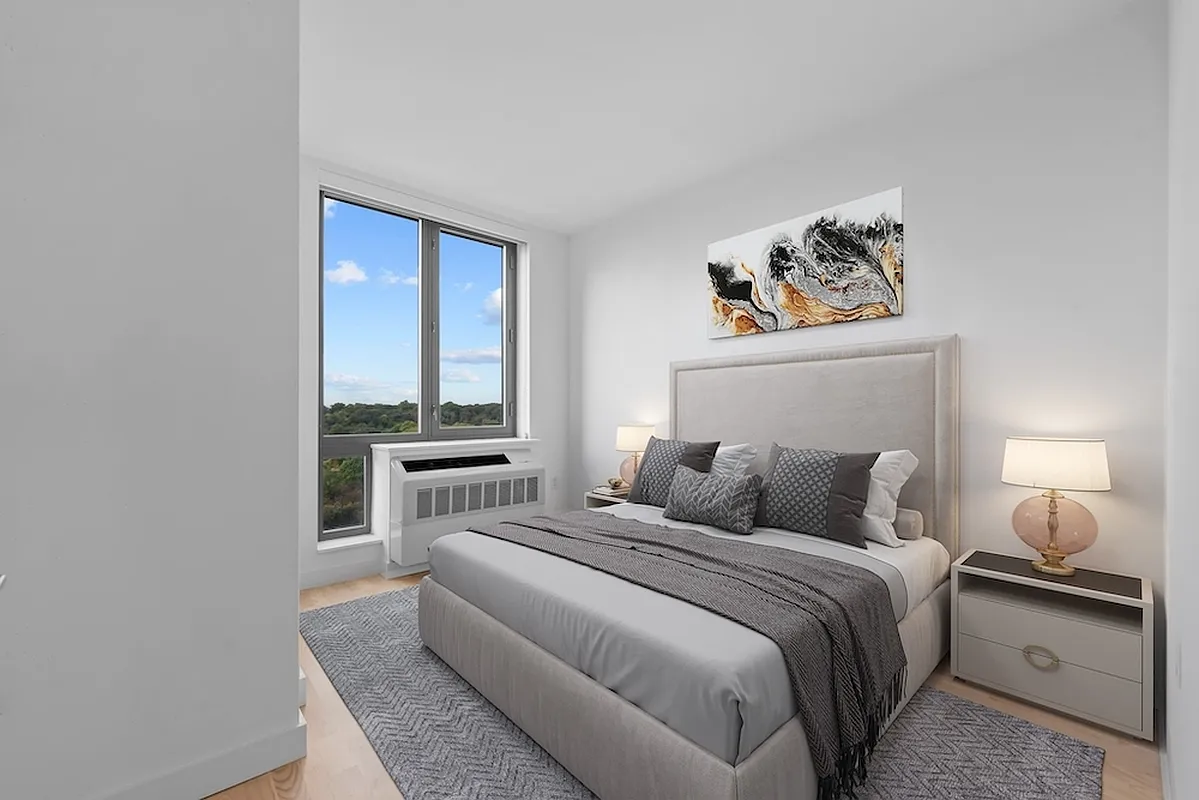 626 Flatbush Avenue, Unit 9H Brooklyn, NY 11225 - Photo 2 of 18 a bedroom with a bed and a window