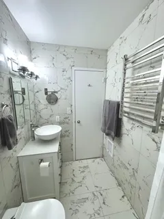 a view of a swimming pool and a deck