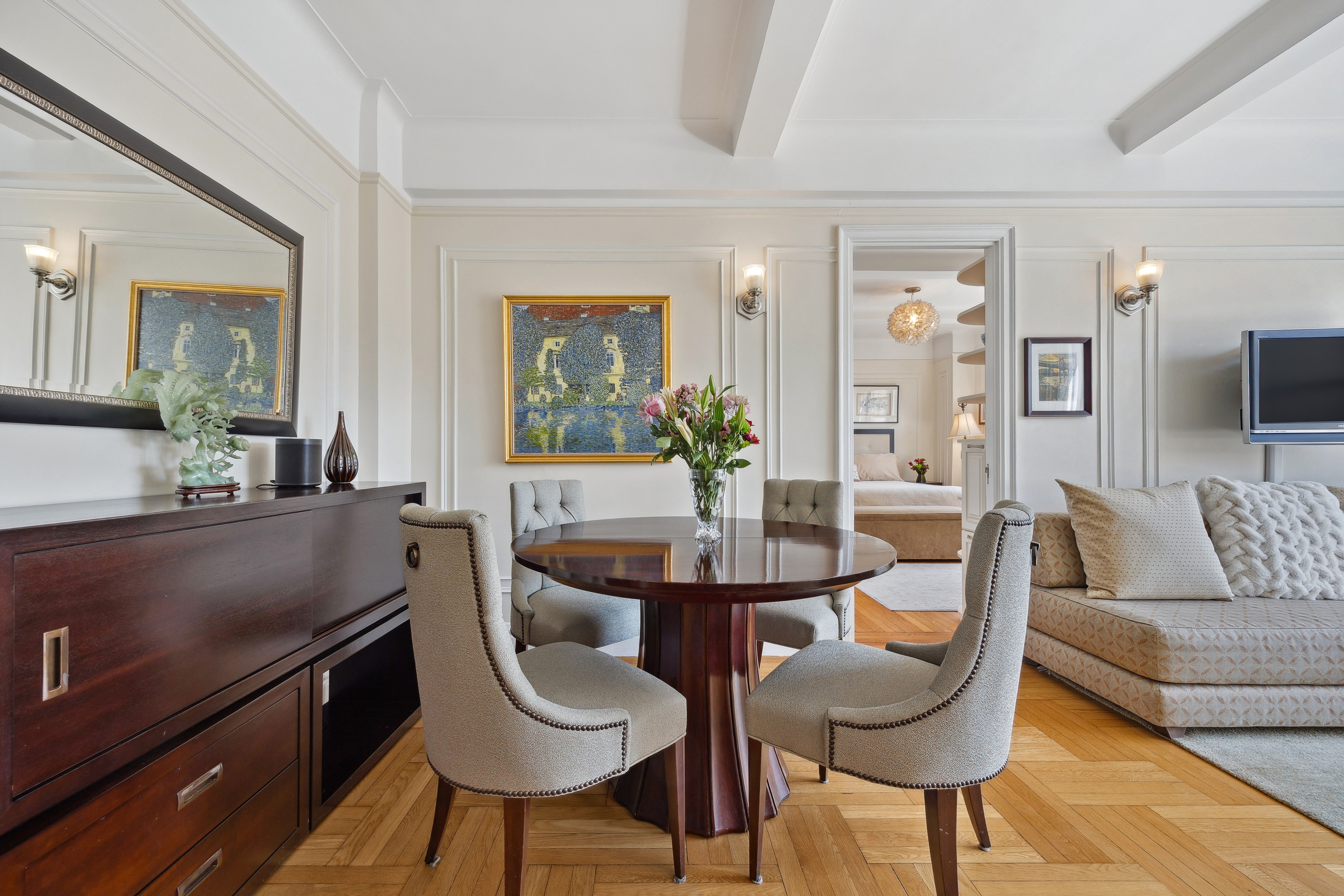 40 West 77th Street, Unit 8C Manhattan, NY 10024 - Photo 5 of 21 a living room with furniture and a potted plant