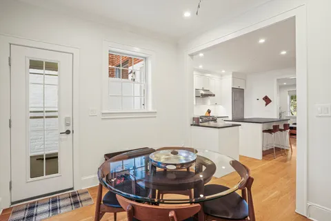 a view of a dining room with furniture
