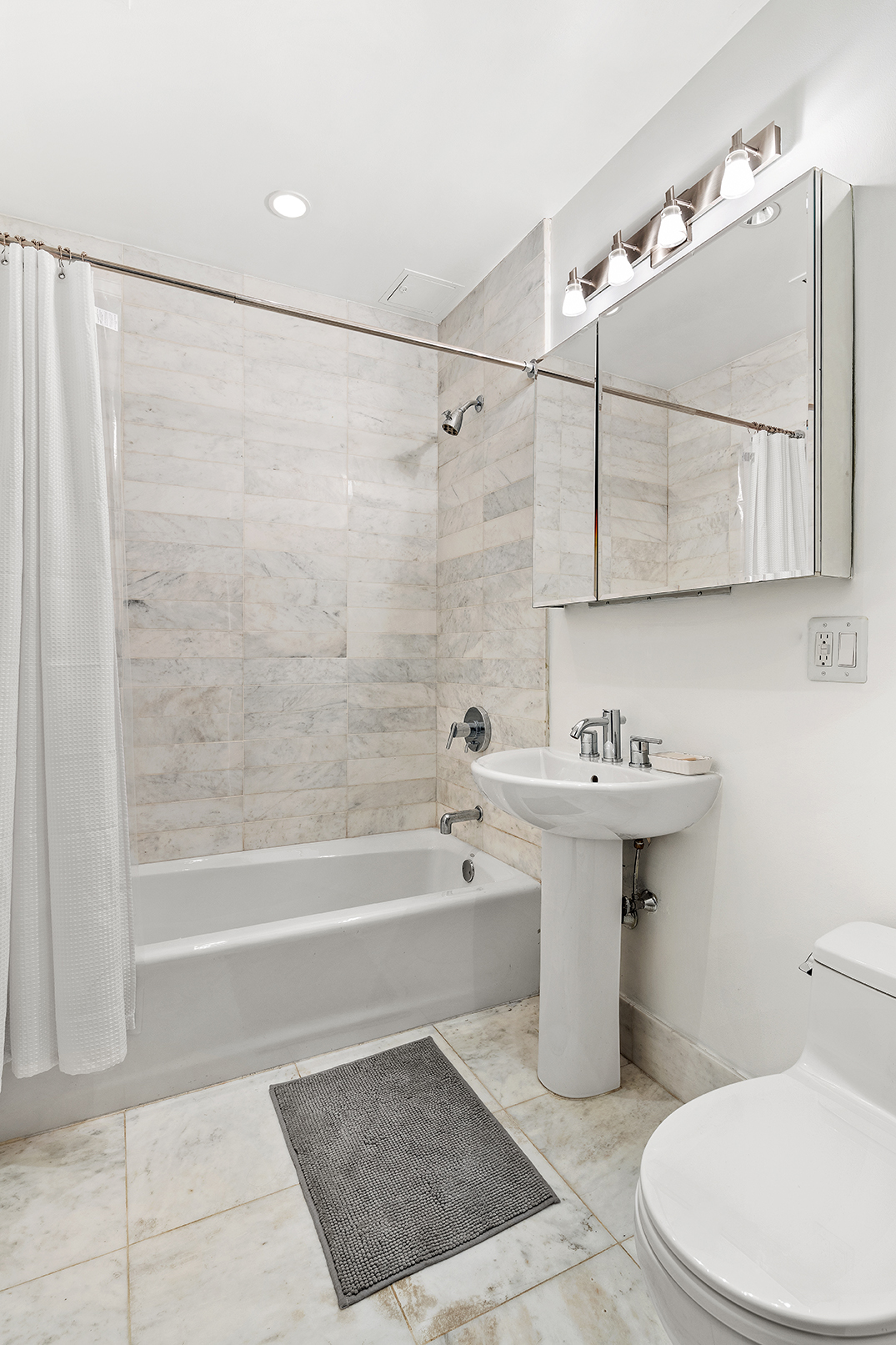 529 Court Street, Unit 204 Brooklyn, NY 11231 - Photo 5 of 9 a bathroom with a sink toilet and shower