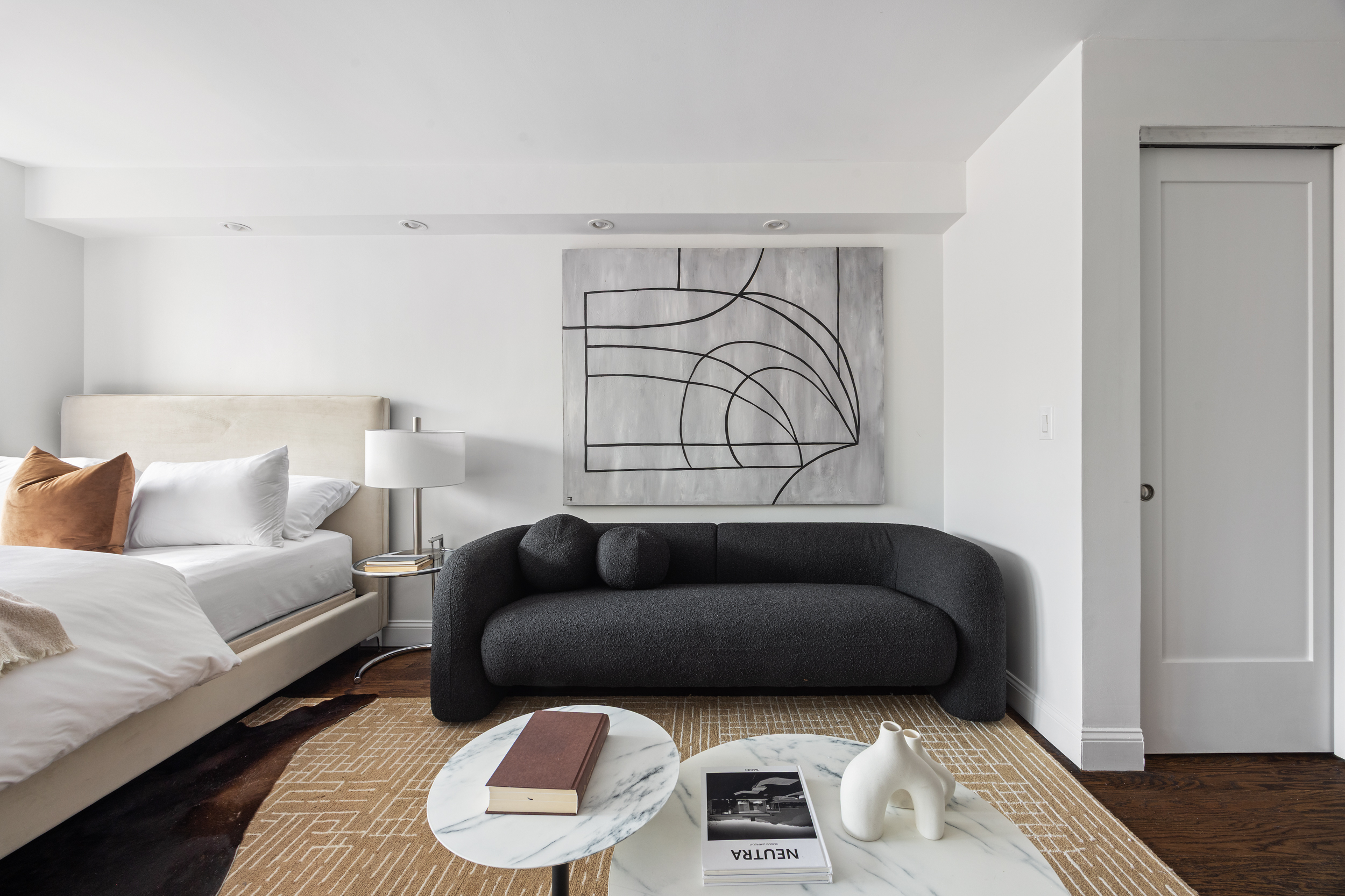 166 East 35th Street, Unit 5F Manhattan, NY 10016 - Photo 3 of 11 a living room with furniture and a wooden floor