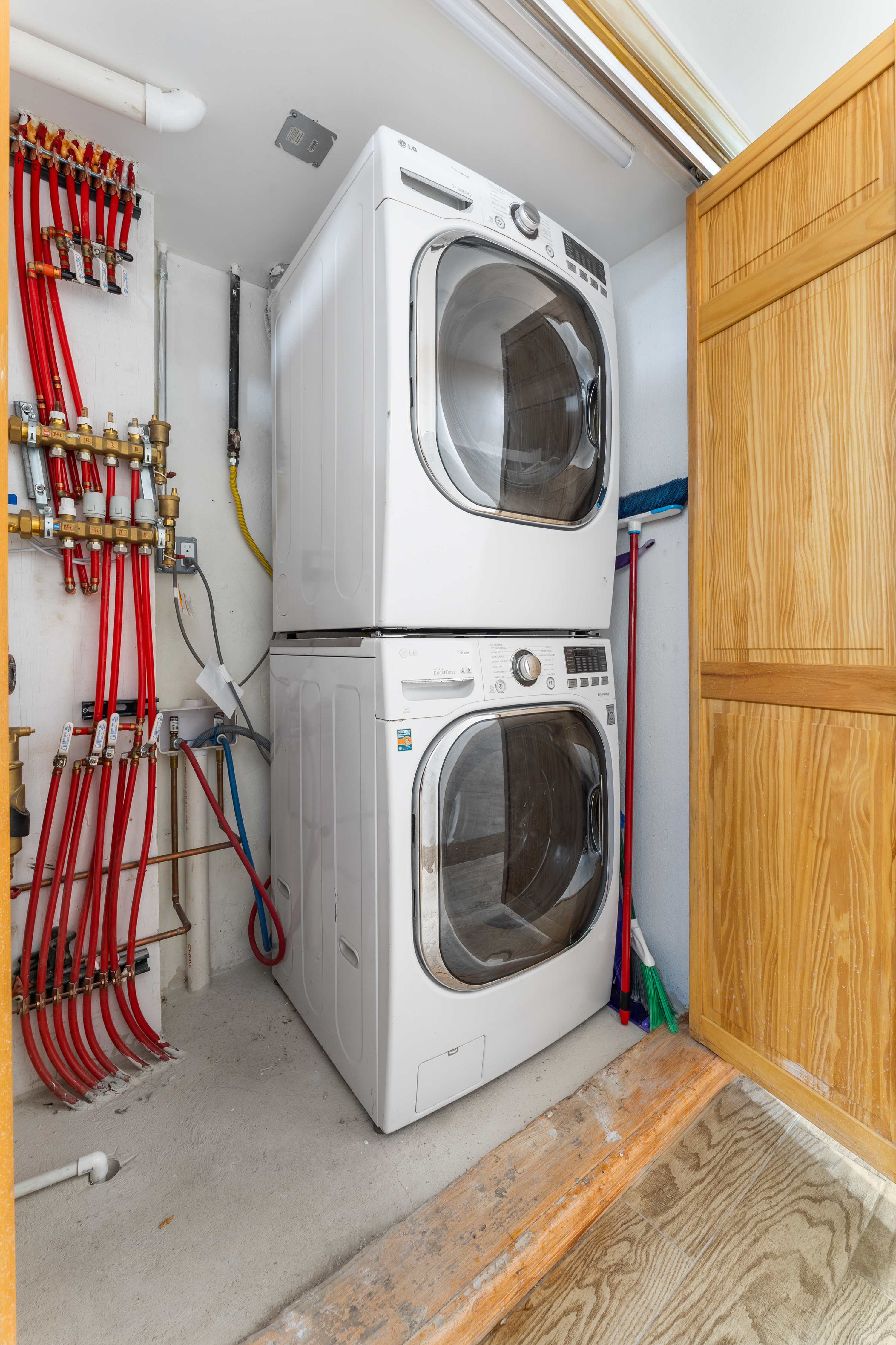 149 Pembroke Street, Unit B Brooklyn, NY 11235 - Photo 6 of 6 a view of a storage & utility room with dryer and washer
