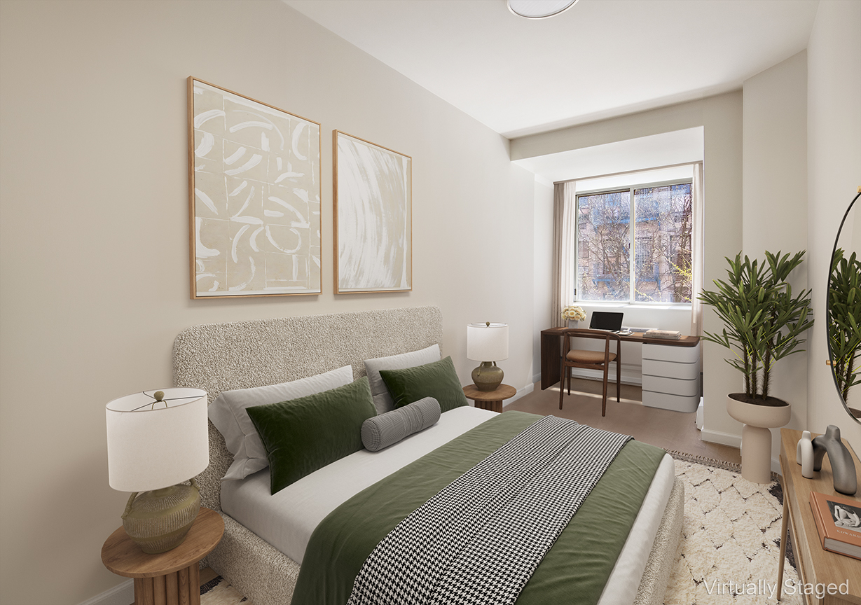194 East 2nd Street, Unit 2C Manhattan, NY 10009 - Photo 6 of 17 a bedroom with a bed a table and chair