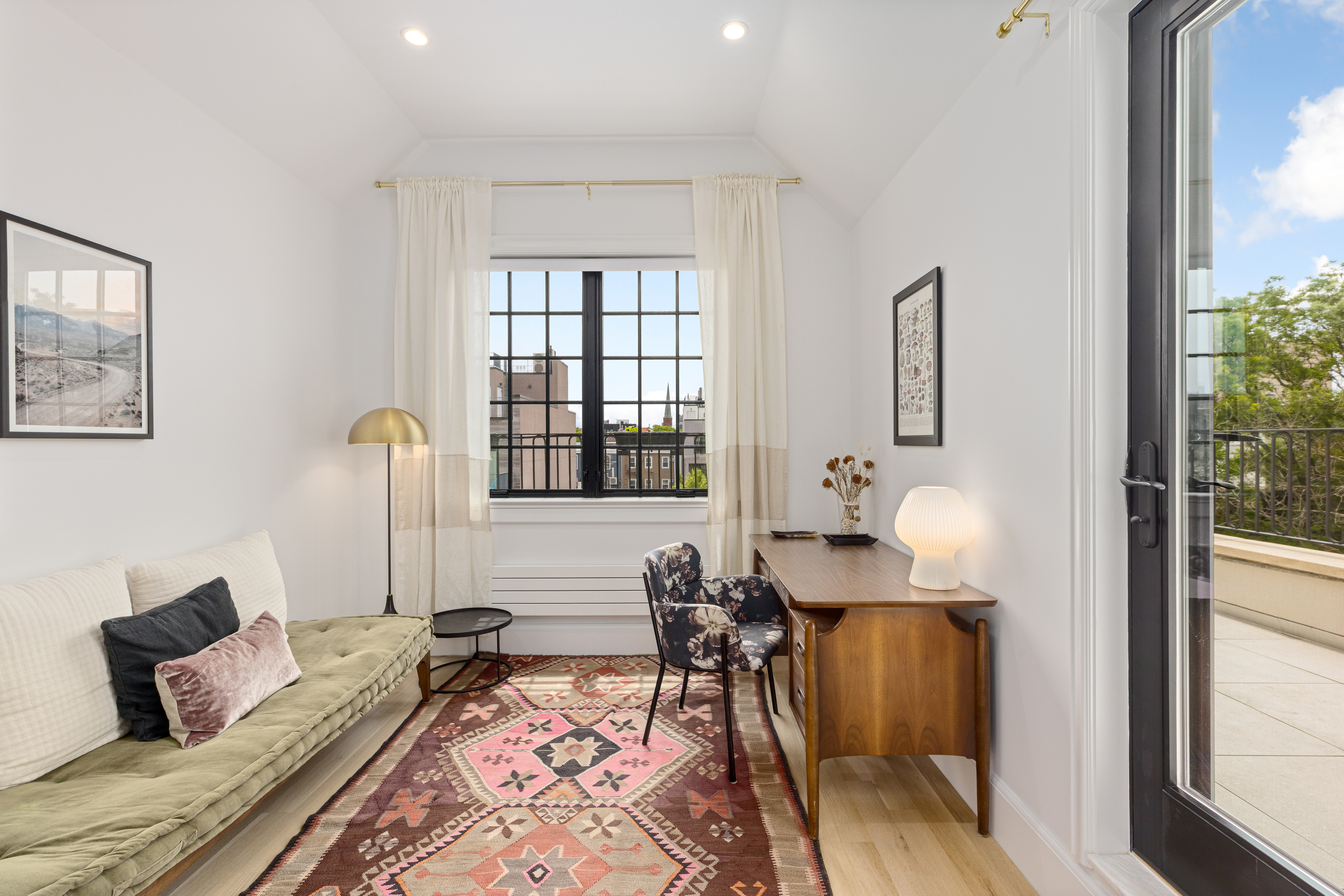 179 Devoe Street Brooklyn, NY 11211 - Photo 14 of 20 a living room with furniture and wooden floor