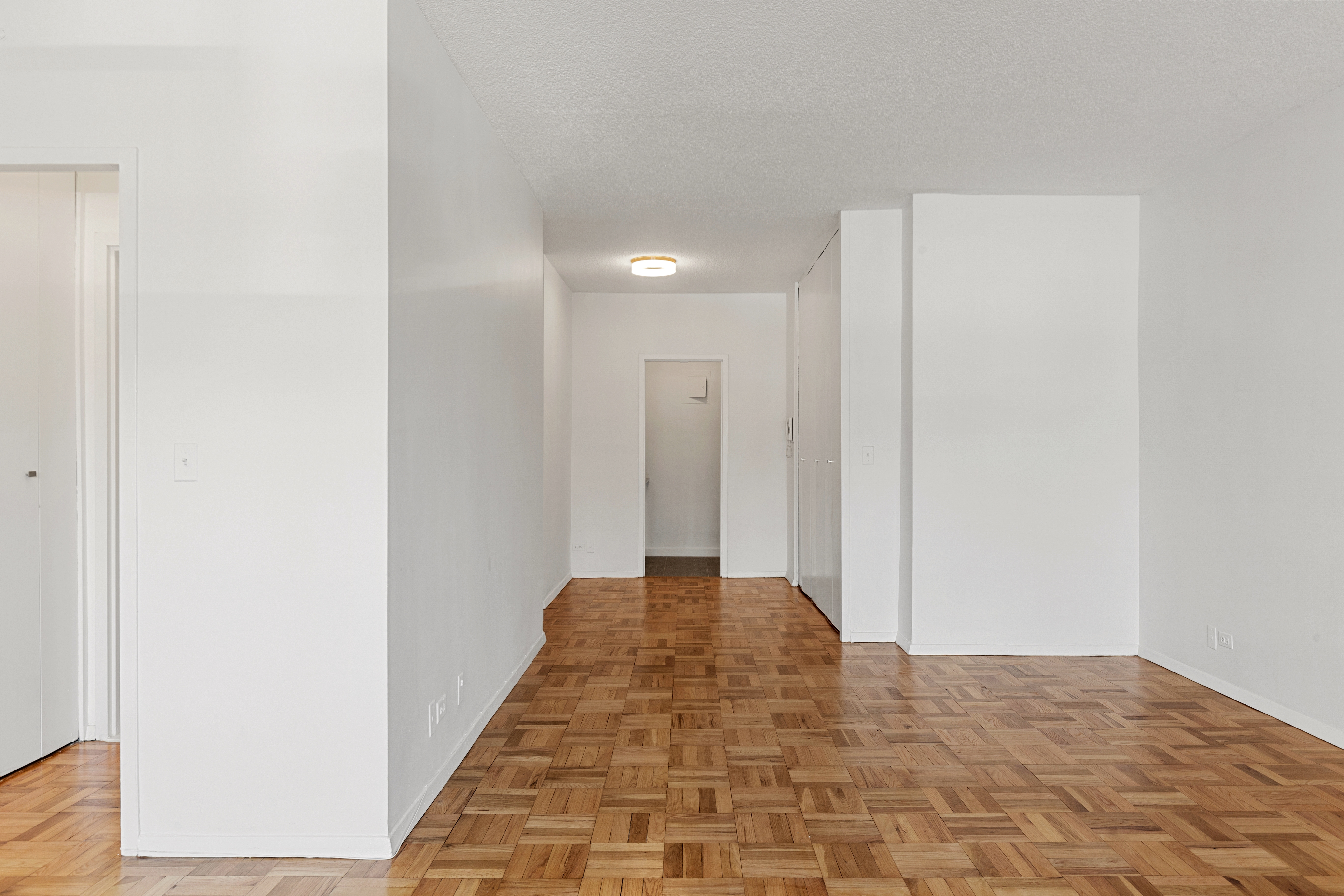60 East 8th Street, Unit 9J Manhattan, NY 10003 - Photo 5 of 13 a view of hallway