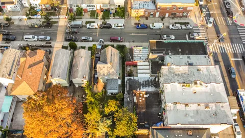 a front view of a building with street view