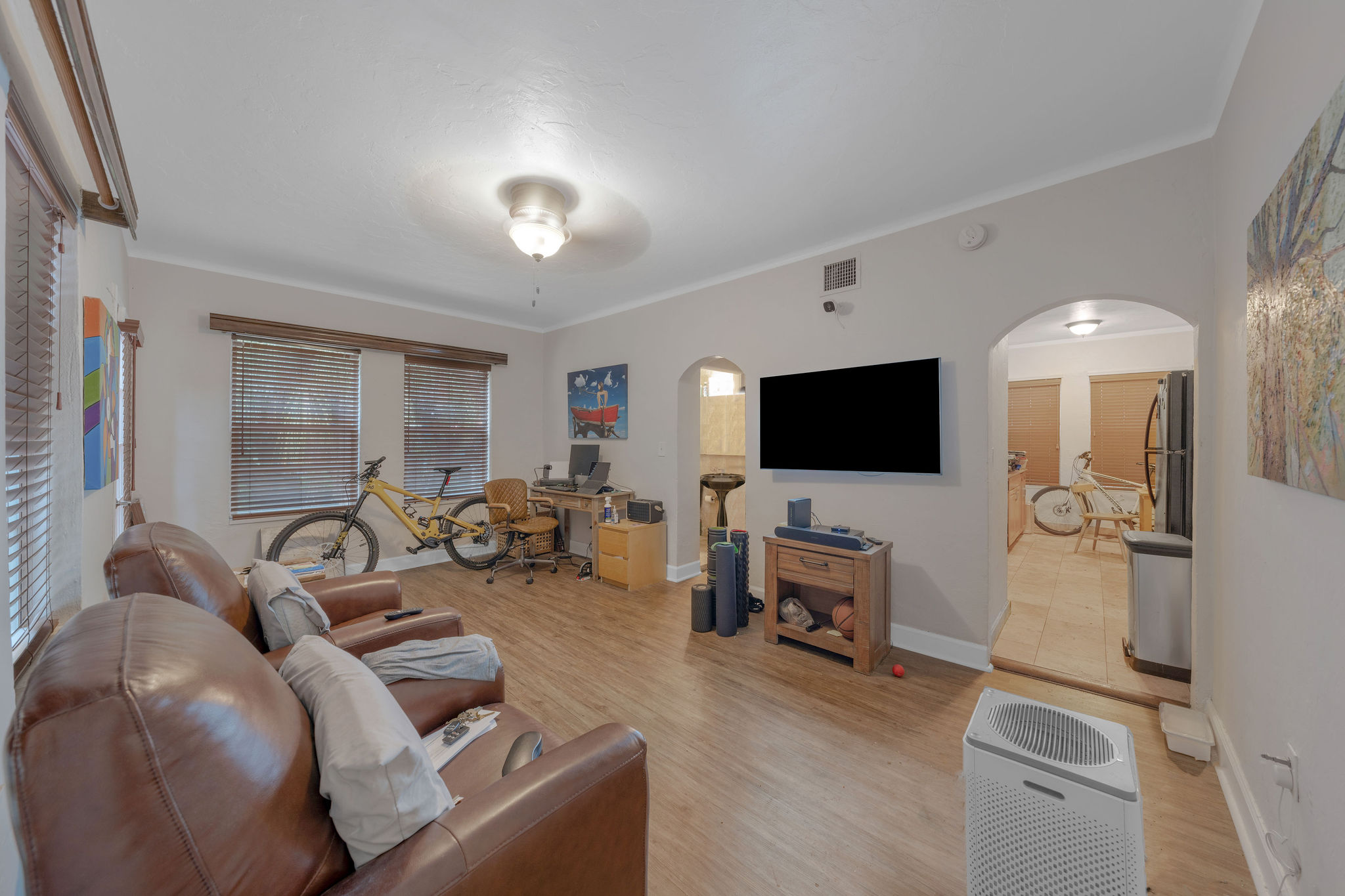 735-745 Meridian Avenue Miami Beach, FL 33139 - Photo 11 of 62 a living room with furniture and a flat screen tv