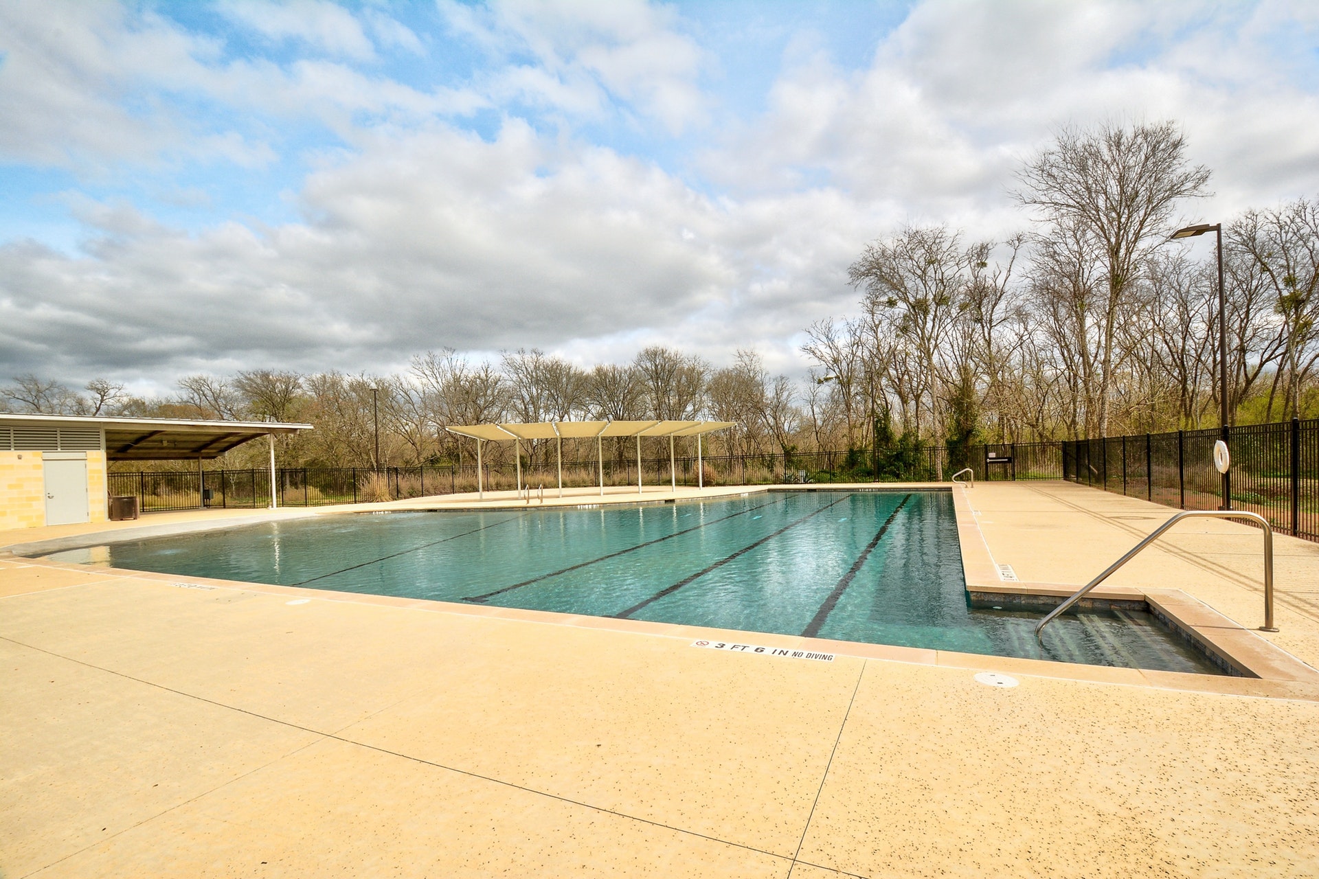 5400 Daimler Drive Austin, TX 78744 - Photo 26 of 27 a view of swimming pool with a yard