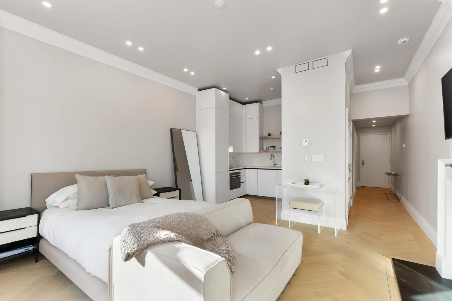 a bedroom with a bed and furniture