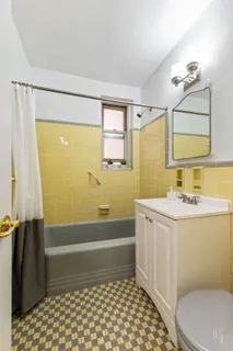 a bathroom with a sink and a bathtub