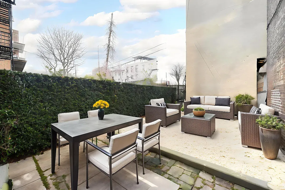 a view of a terrace with furniture