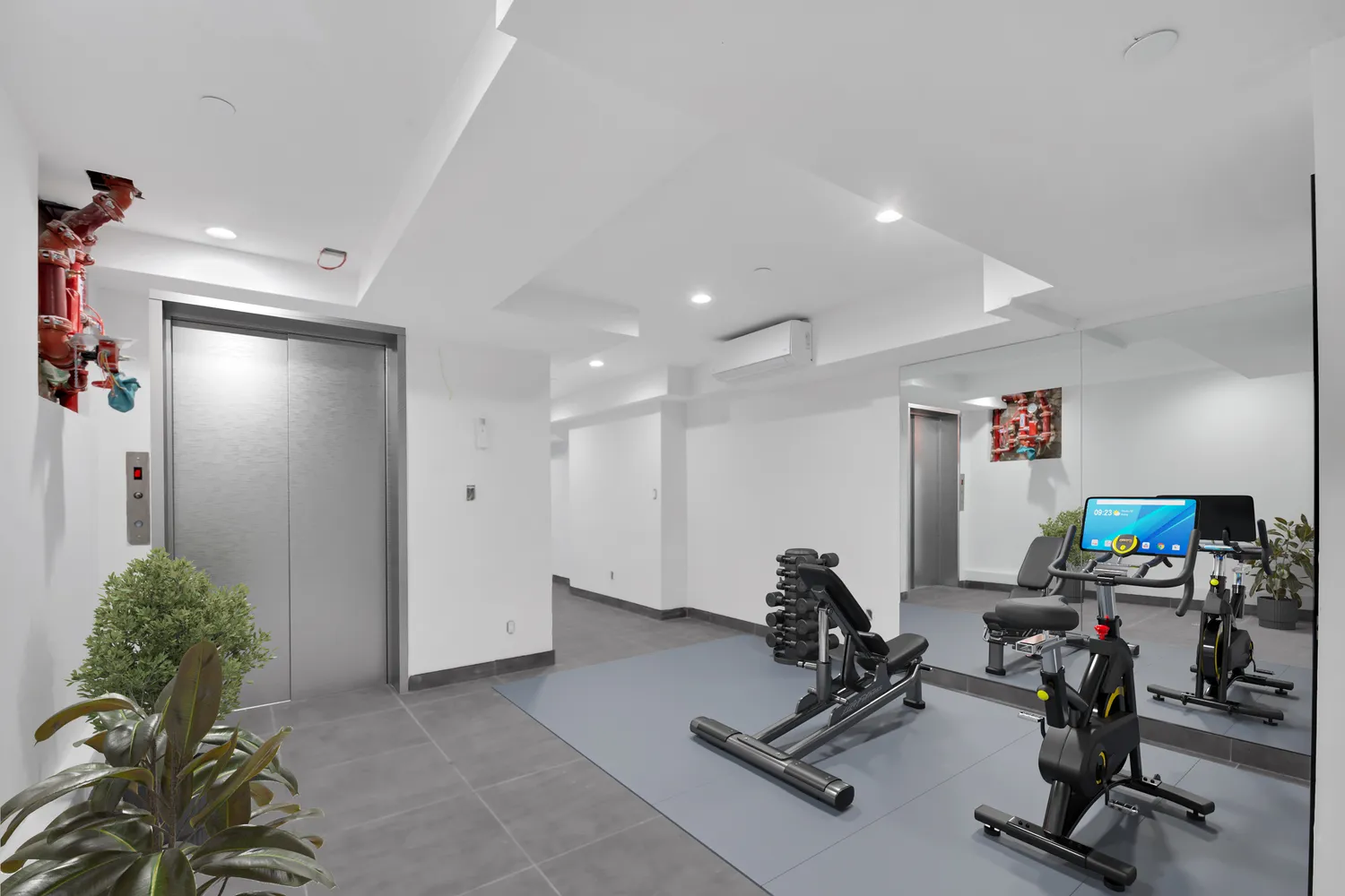 a view of a room with gym equipment