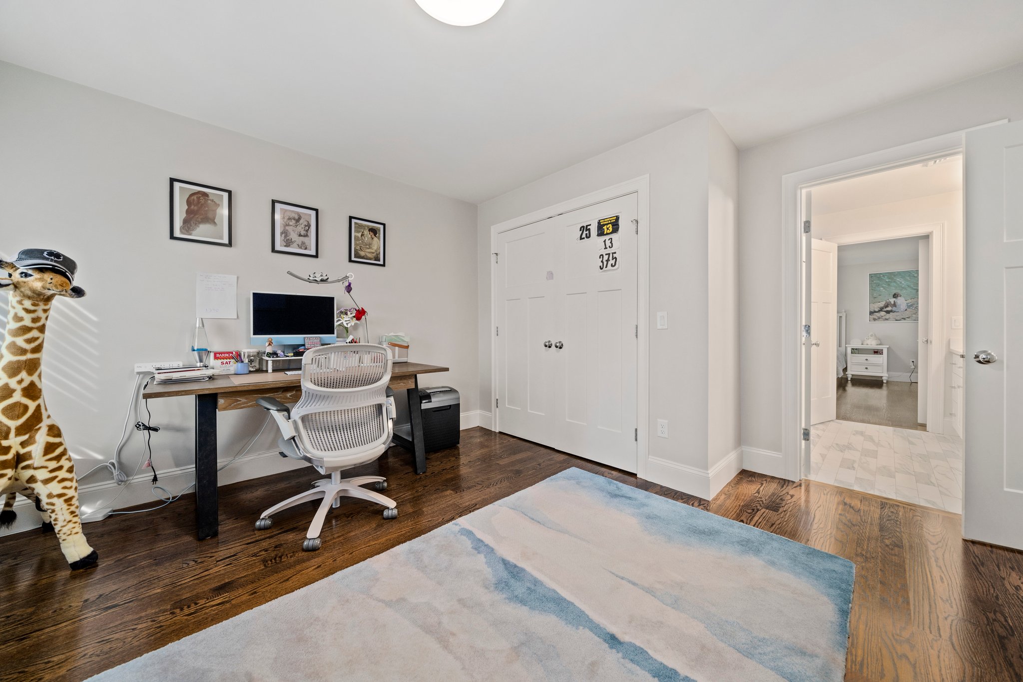 241 Lowell Road Wellesley, MA 02481 - Photo 31 of 85 a workspace with wooden floor and a workspace