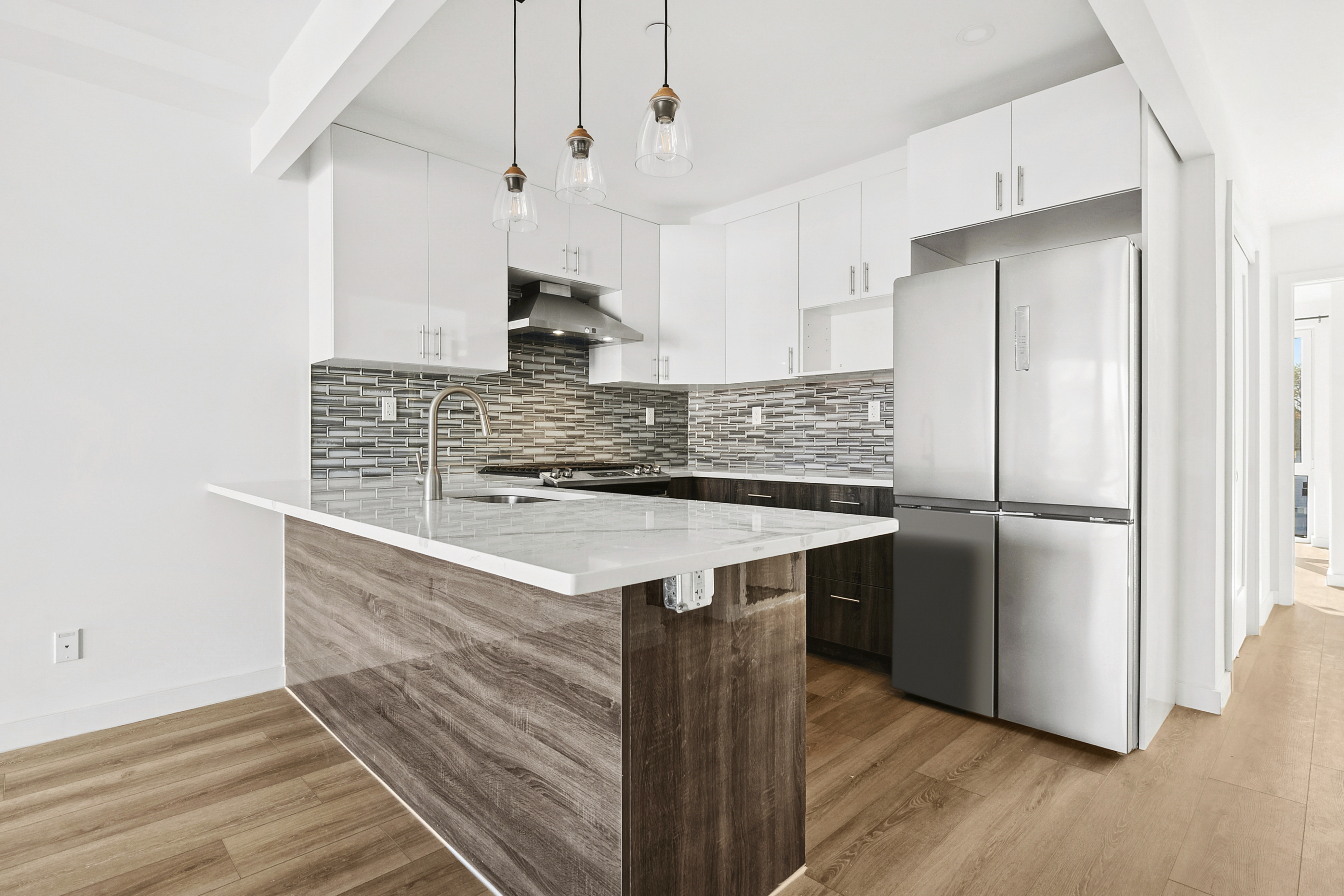 176 12th Street, Unit 2 Brooklyn, NY 11215 - Photo 2 of 10 a kitchen with stainless steel appliances granite countertop a sink and a refrigerator