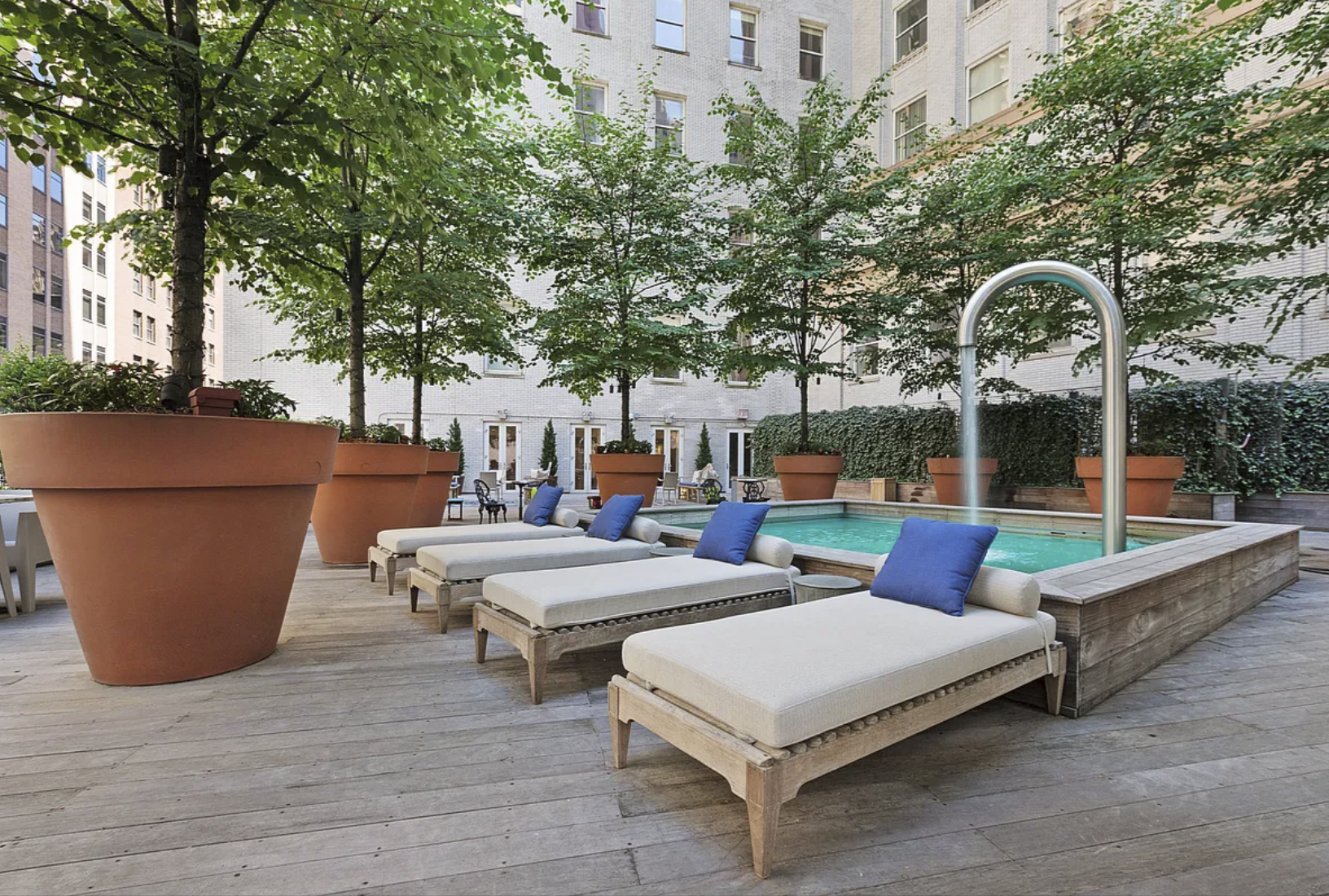 15 Broad Street, Unit 2300 Manhattan, NY 10005 - Photo 22 of 36 a view of an outdoor sitting area with furniture and garden