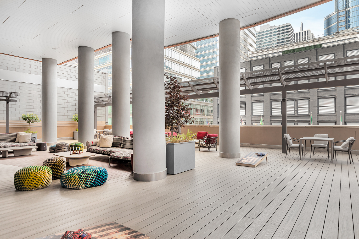 205 East 59th Street, Unit 19A Manhattan, NY 10022 - Photo 11 of 14 a living room filled with furniture and a large window