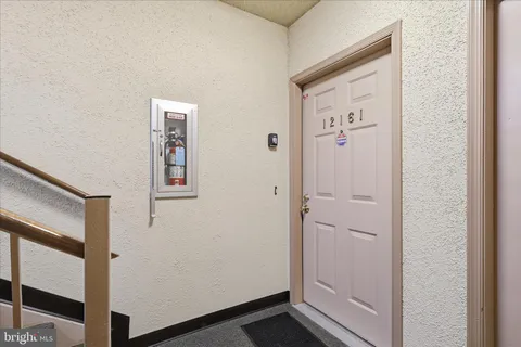 a view of a hallway with elevator