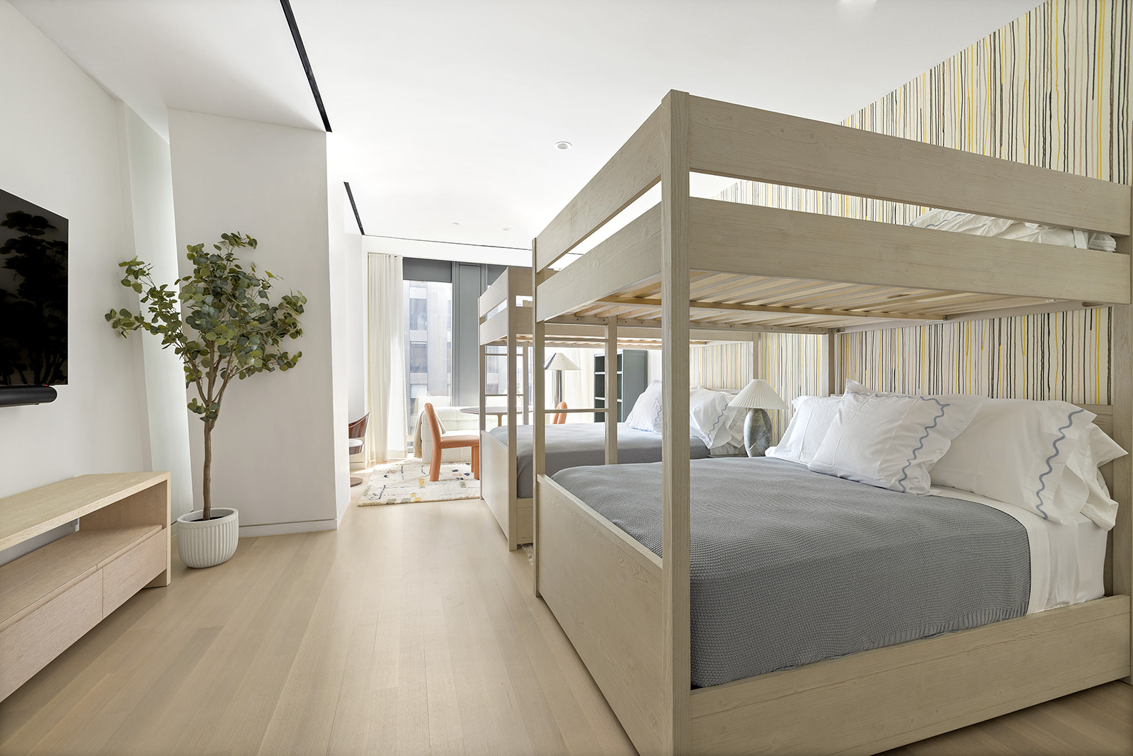 53 West 53rd Street, Unit 28D Manhattan, NY 10019 - Photo 7 of 22 a living room with furniture