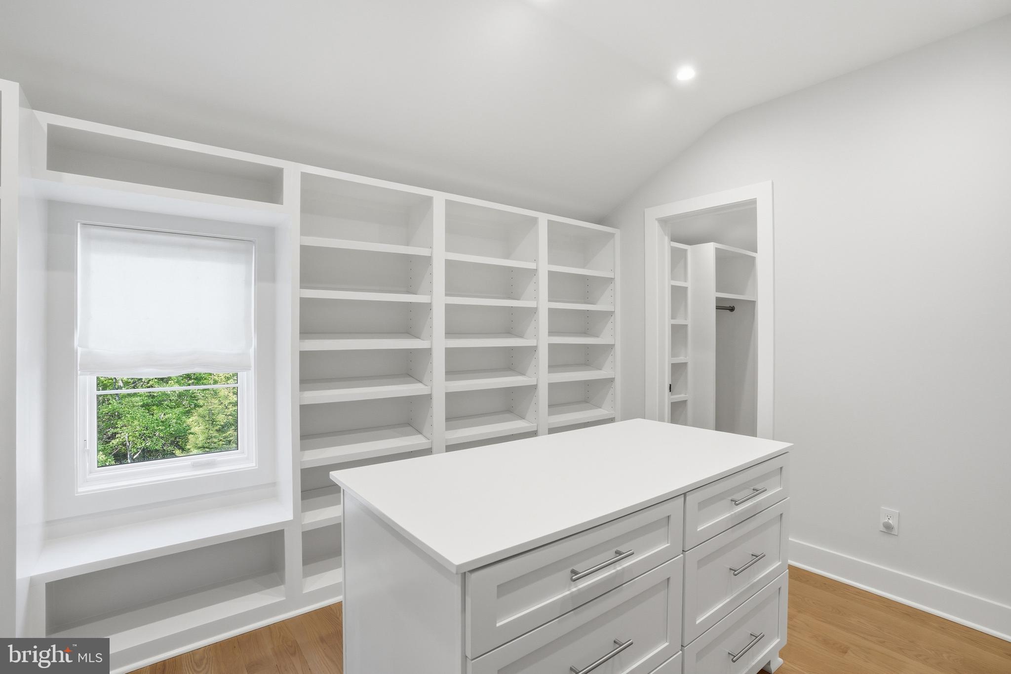 938 Saigon Road McLean, VA 22102 - Photo 58 of 107 a room with a wooden floor and a window