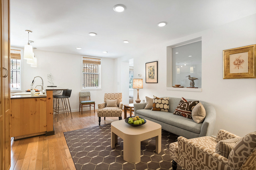 315 Washington Avenue Brooklyn, NY 11205 - Photo 33 of 38 a living room with furniture and a couch