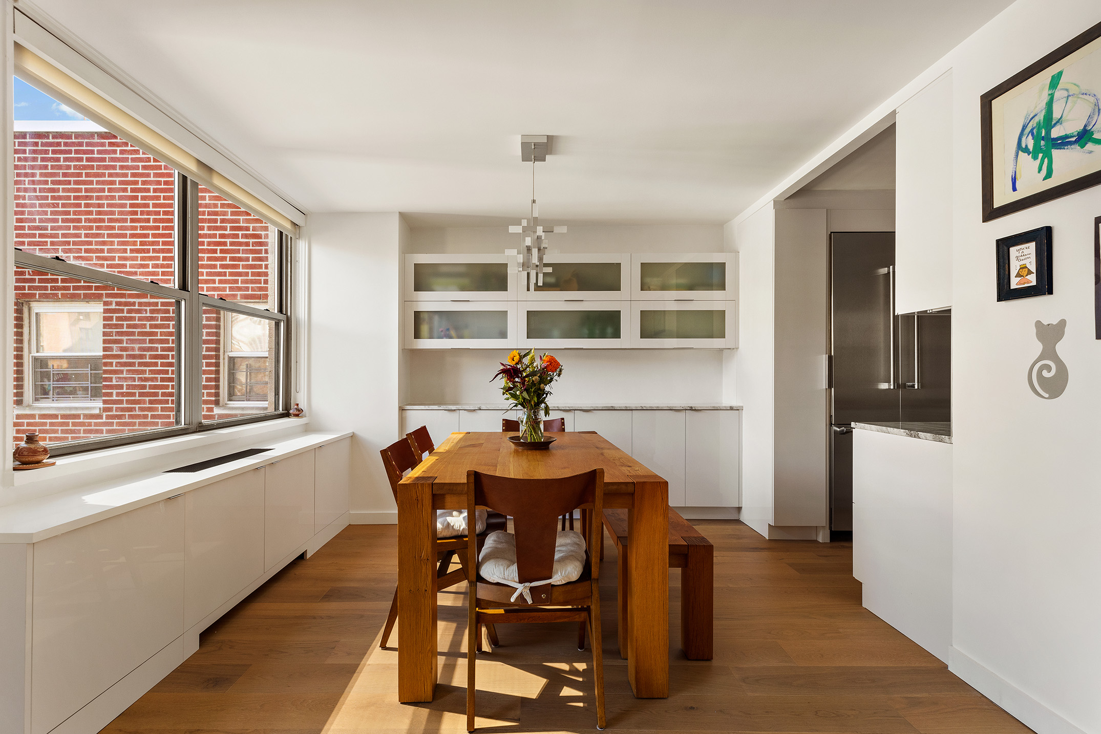 444 East 86th Street, Unit 15G Manhattan, NY 10028 - Photo 4 of 12 a dining room with furniture and window