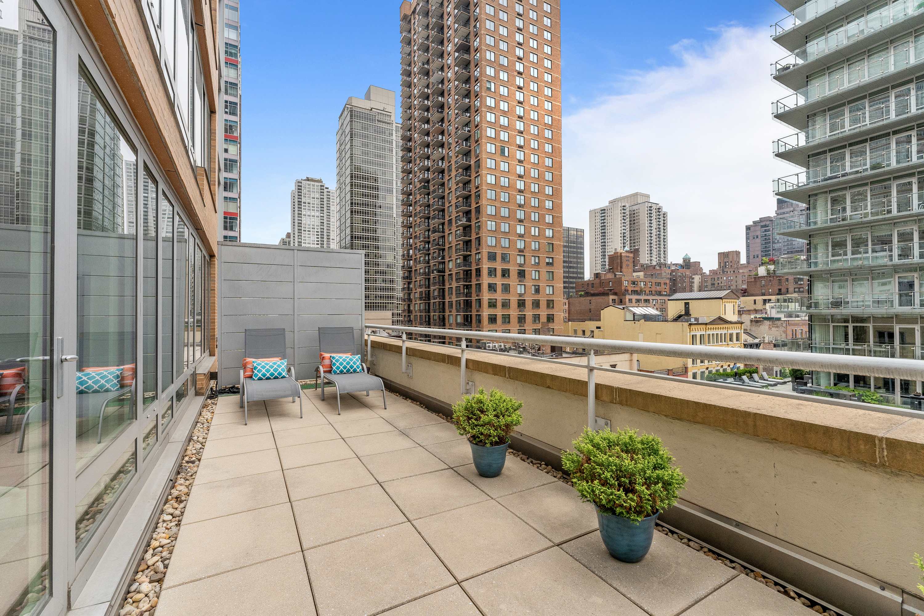 250 East 53rd Street, Unit 903 Manhattan, NY 10022 - Photo 7 of 8 a view of balcony with seating space