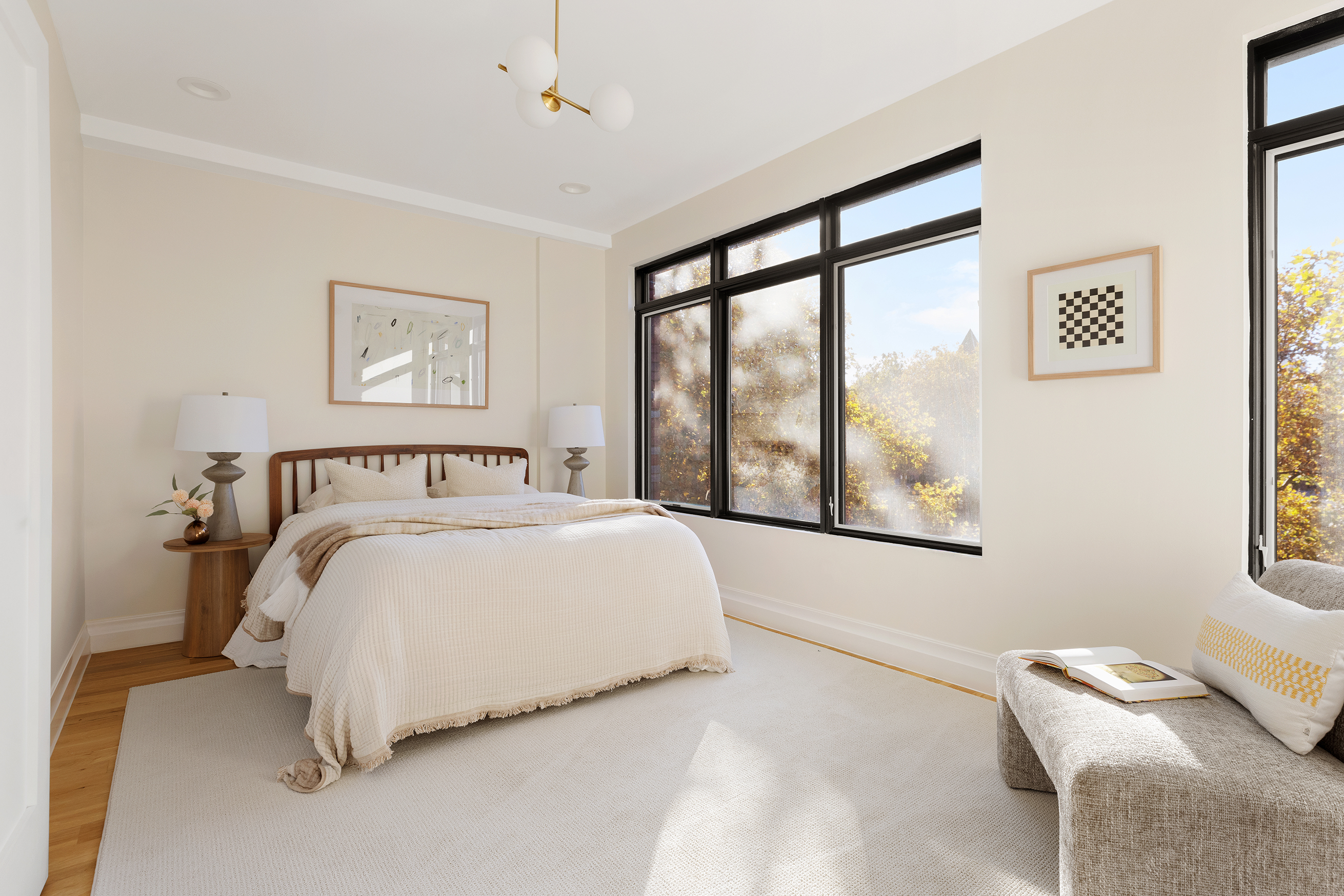 203 Halsey Street Brooklyn, NY 11216 - Photo 10 of 21 a bedroom with a bed and a large window