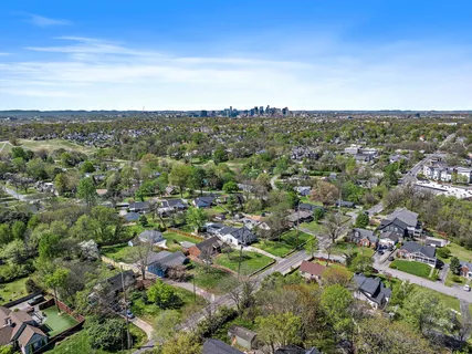 an aerial view of a city with lots of residential buildings