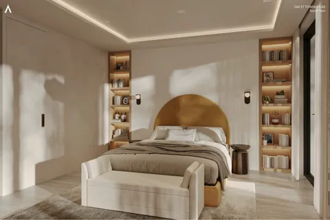 a bedroom with a bed and a couch