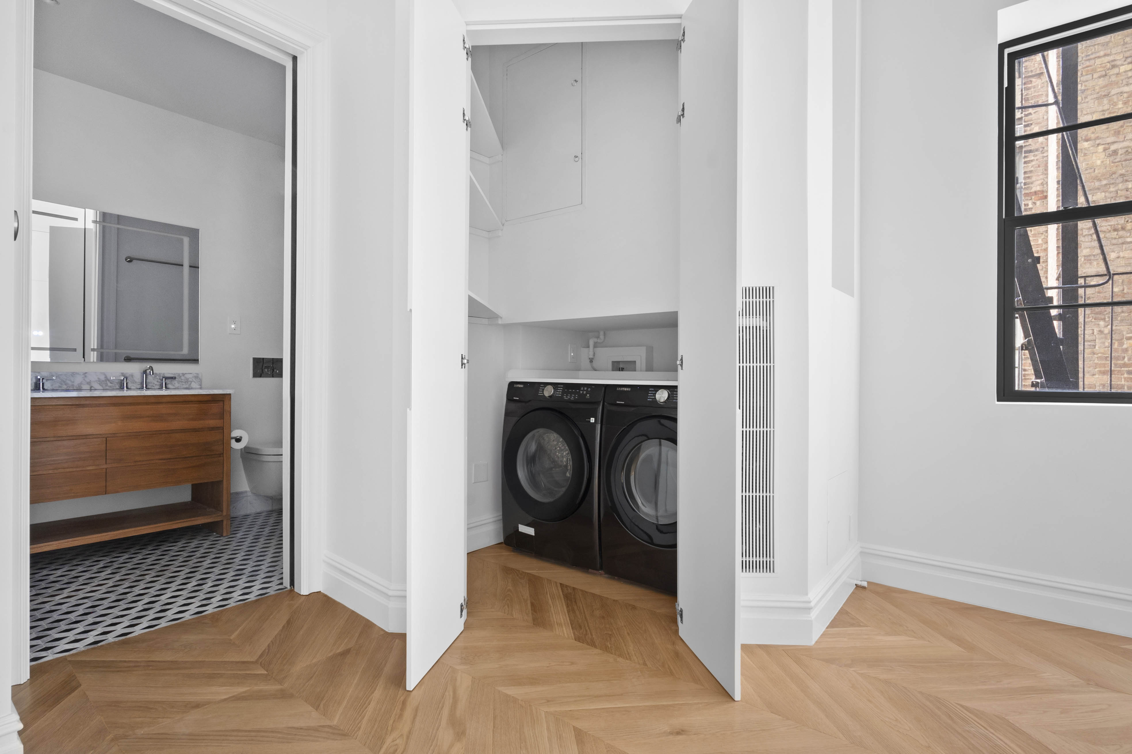 33 West 67th Street, Unit 4M Manhattan, NY 10023 - Photo 9 of 16 a view of a livingroom with furniture and staircase