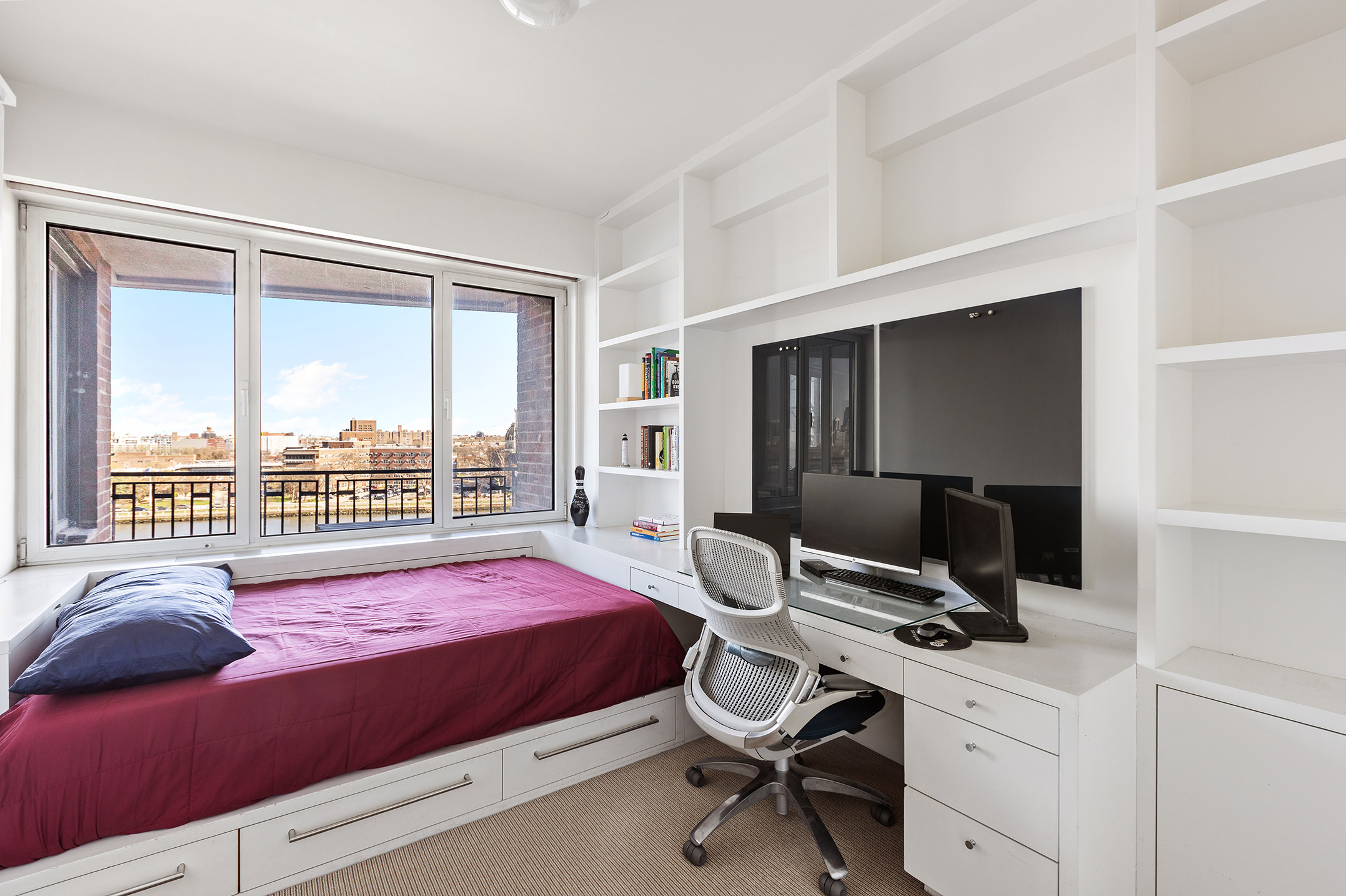 45 East End Avenue, Unit 6/7B Manhattan, NY 10028 - Photo 11 of 17 a bedroom with a bed and a desk