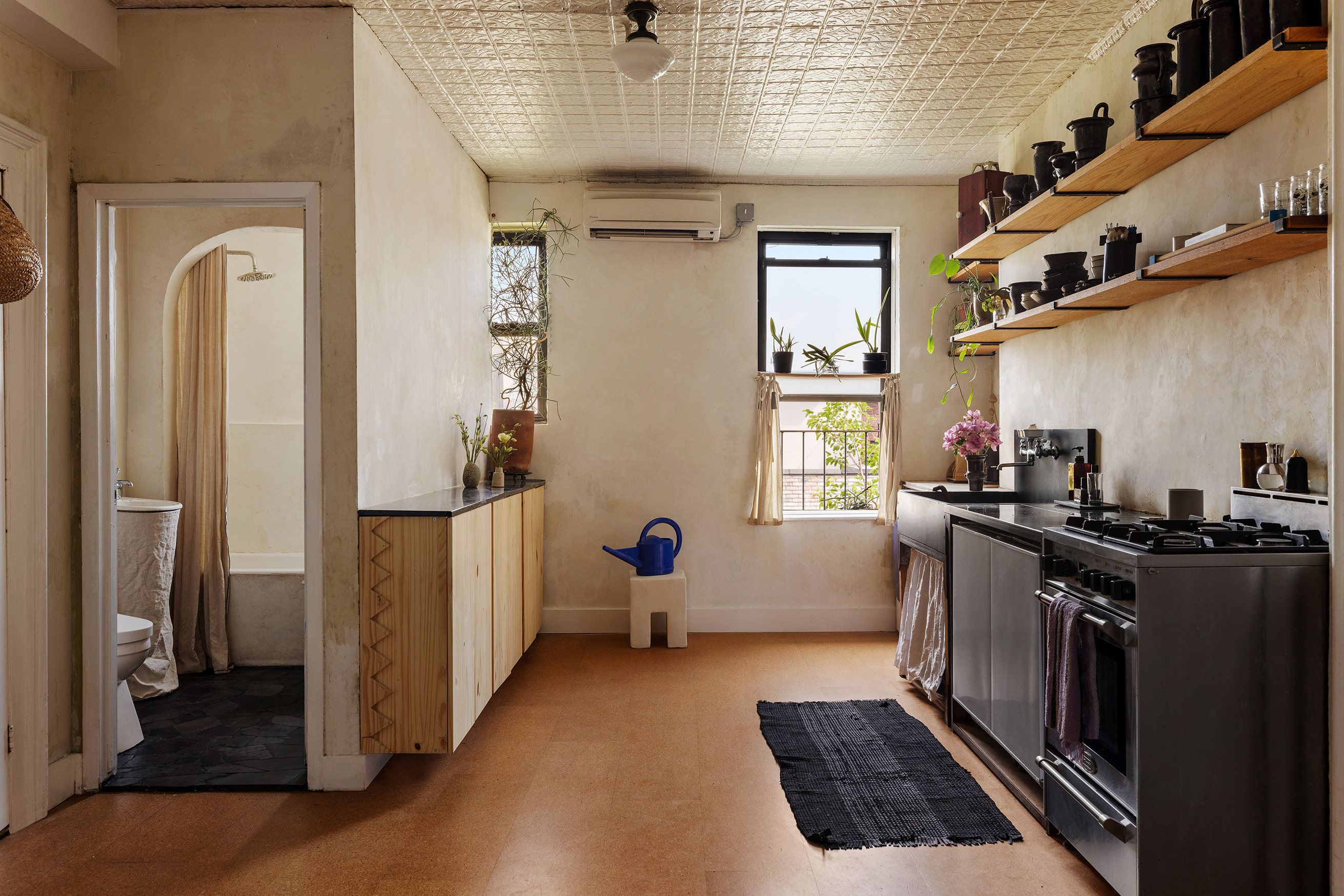 a kitchen with stainless steel appliances granite countertop a stove and a refrigerator