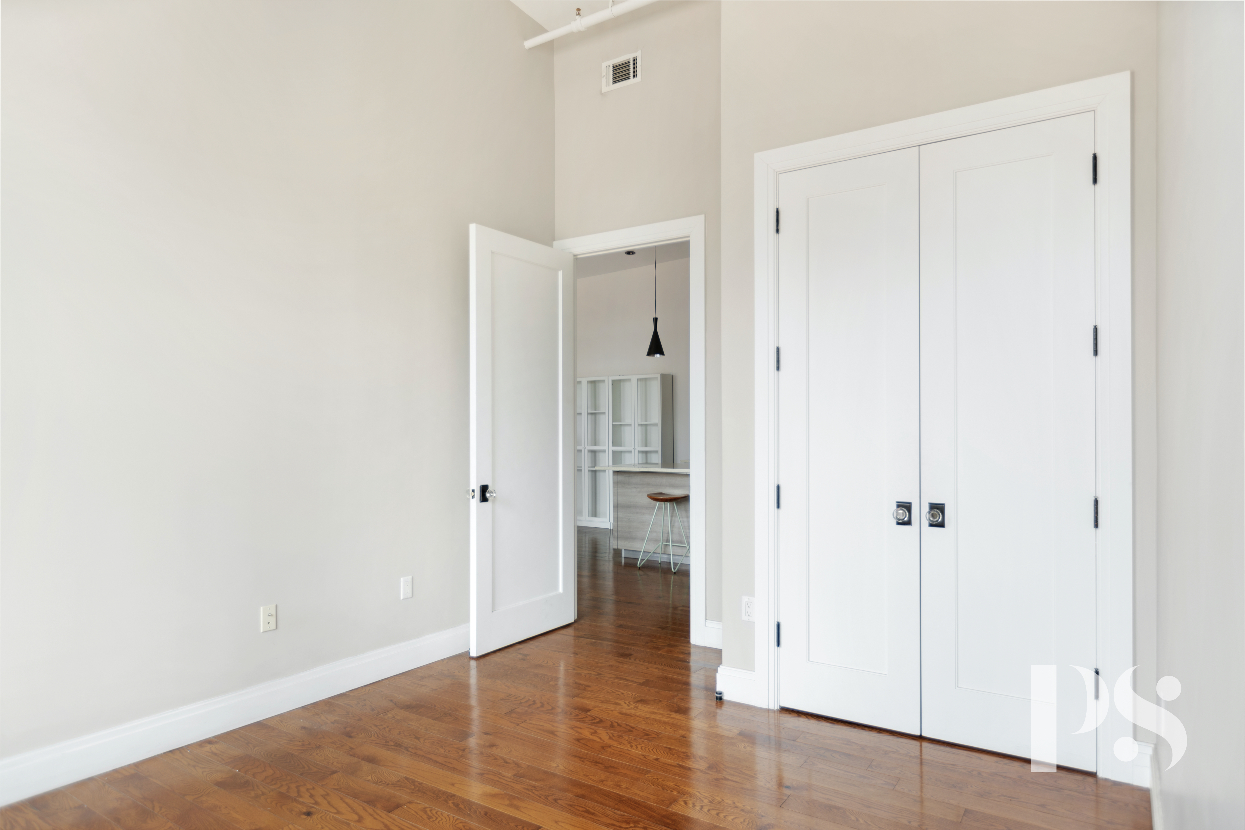 2 Wooster Street, Unit 5A Manhattan, NY 10013 - Photo 10 of 12 wooden floor with white walls