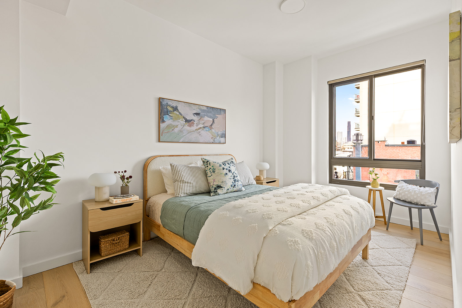 500 4th Avenue, Unit 4D Brooklyn, NY 11215 - Photo 5 of 11 a bedroom with a bed and a large window