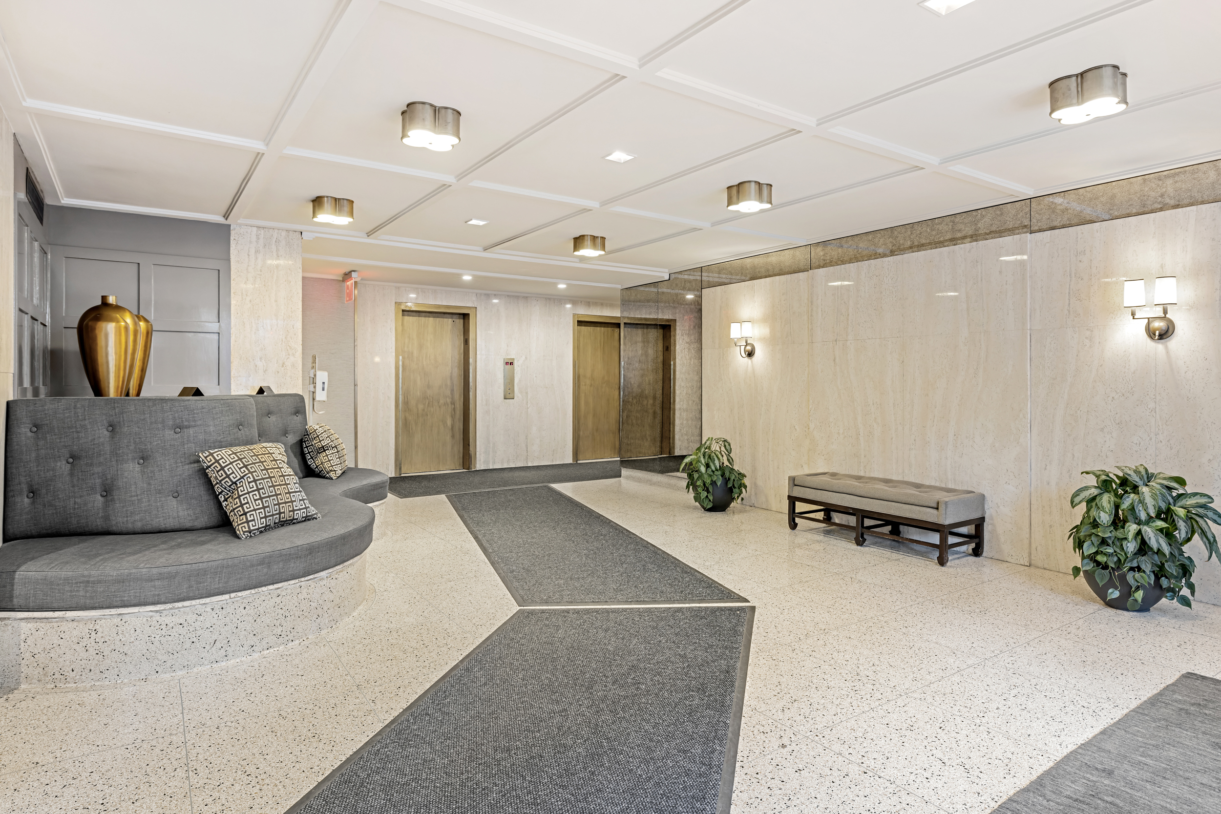 330 3rd Avenue, Unit 18F Manhattan, NY 10010 - Photo 9 of 10 a spacious bedroom with a bed and furniture