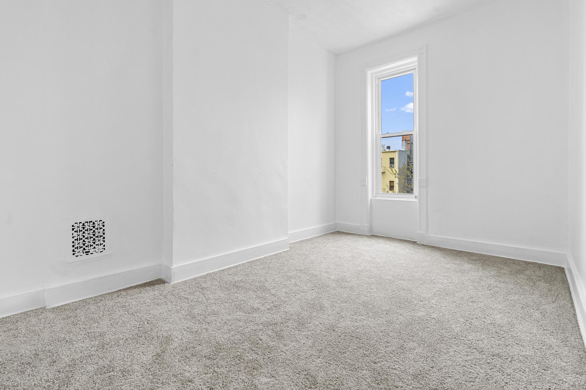 43 Linden Street, Unit 3 Brooklyn, NY 11221 - Photo 7 of 8 an empty room with windows