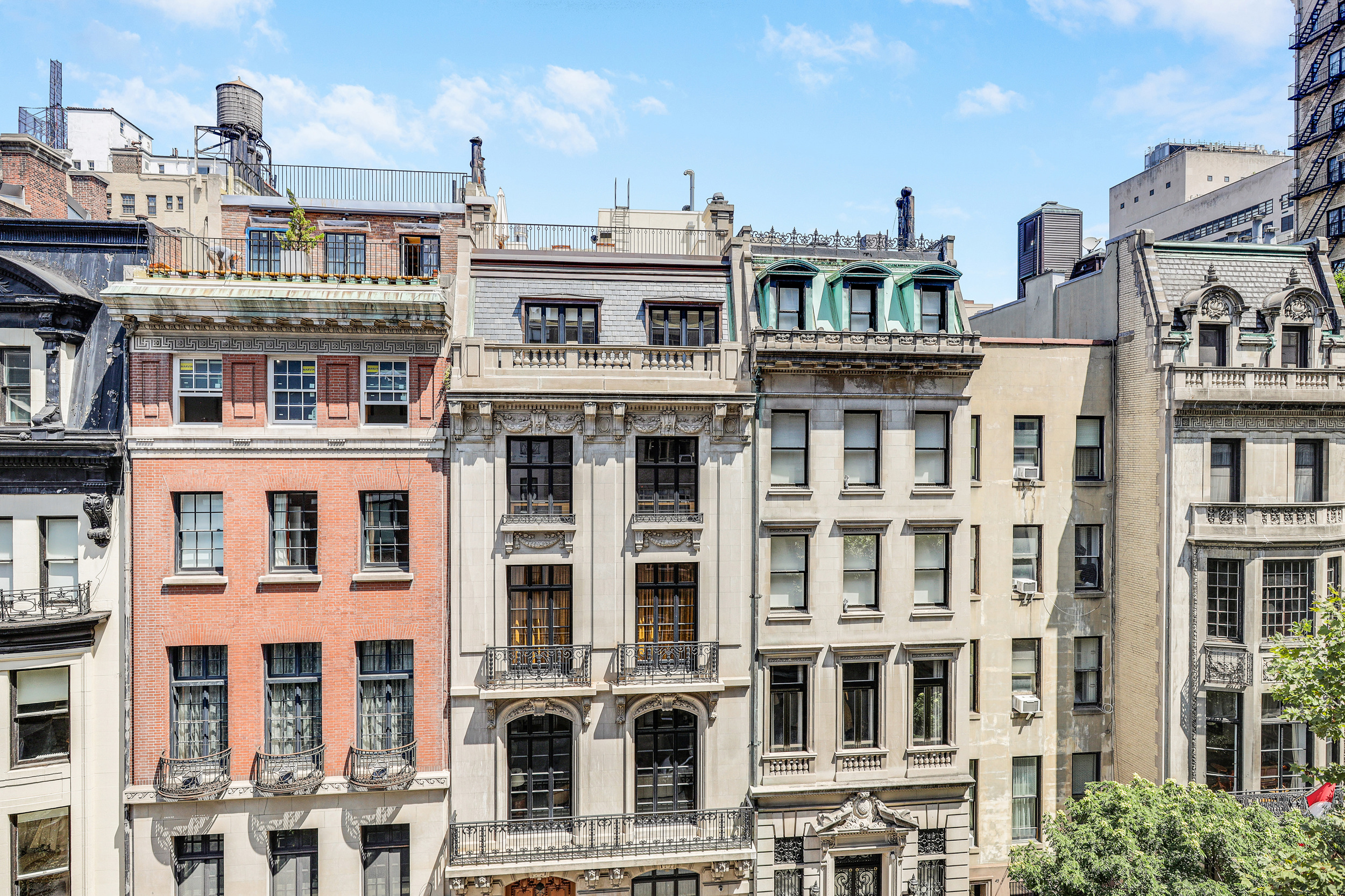 44 East 67th Street, Unit 6C Manhattan, NY 10065 - Photo 8 of 9 a front view of a multi story building