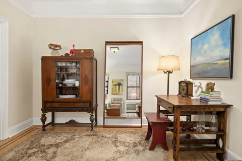 a view of a workspace with furniture