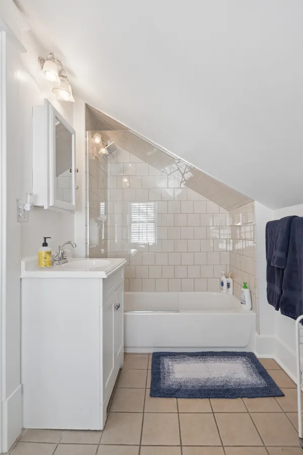 a front view of house with yard and outdoor seating