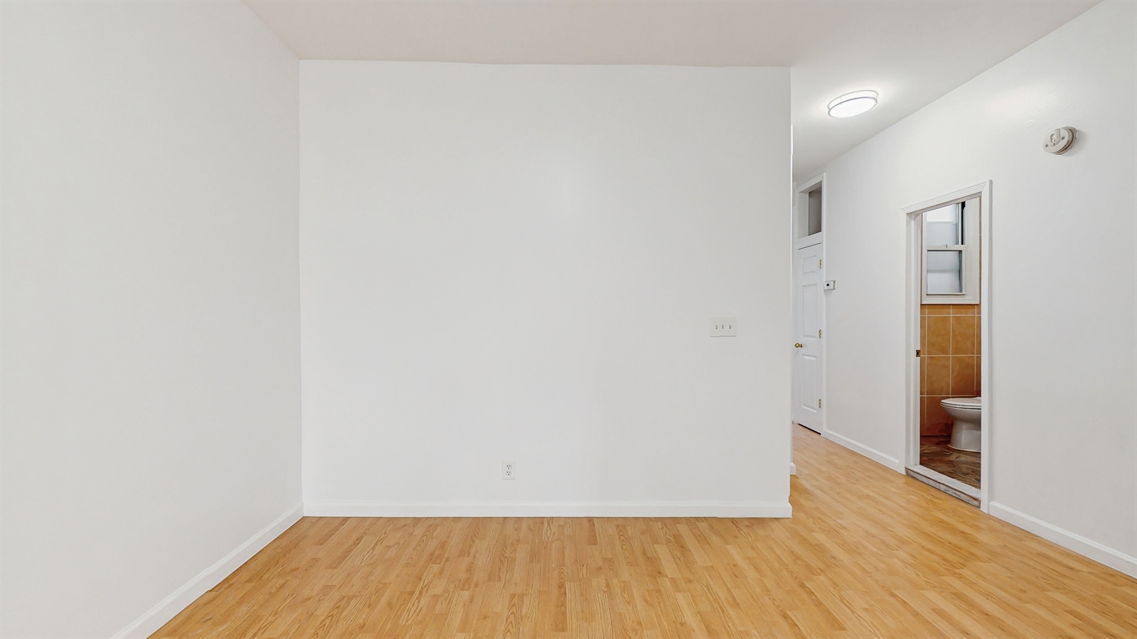 454 77th Street, Unit 3 Brooklyn, NY 11209 - Photo 14 of 25 a view of small space with wooden floor