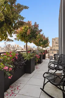 a view of a terrace with furniture