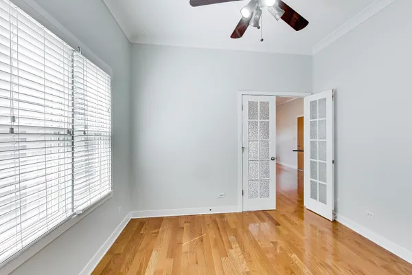 a view of an empty room with a window