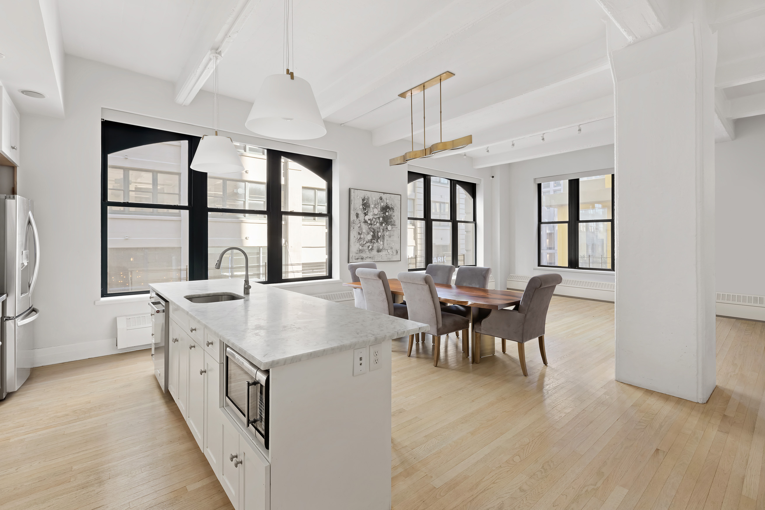 30 Main Street, Unit 3C Brooklyn, NY 11201 - Photo 4 of 18 a living room with furniture and a table