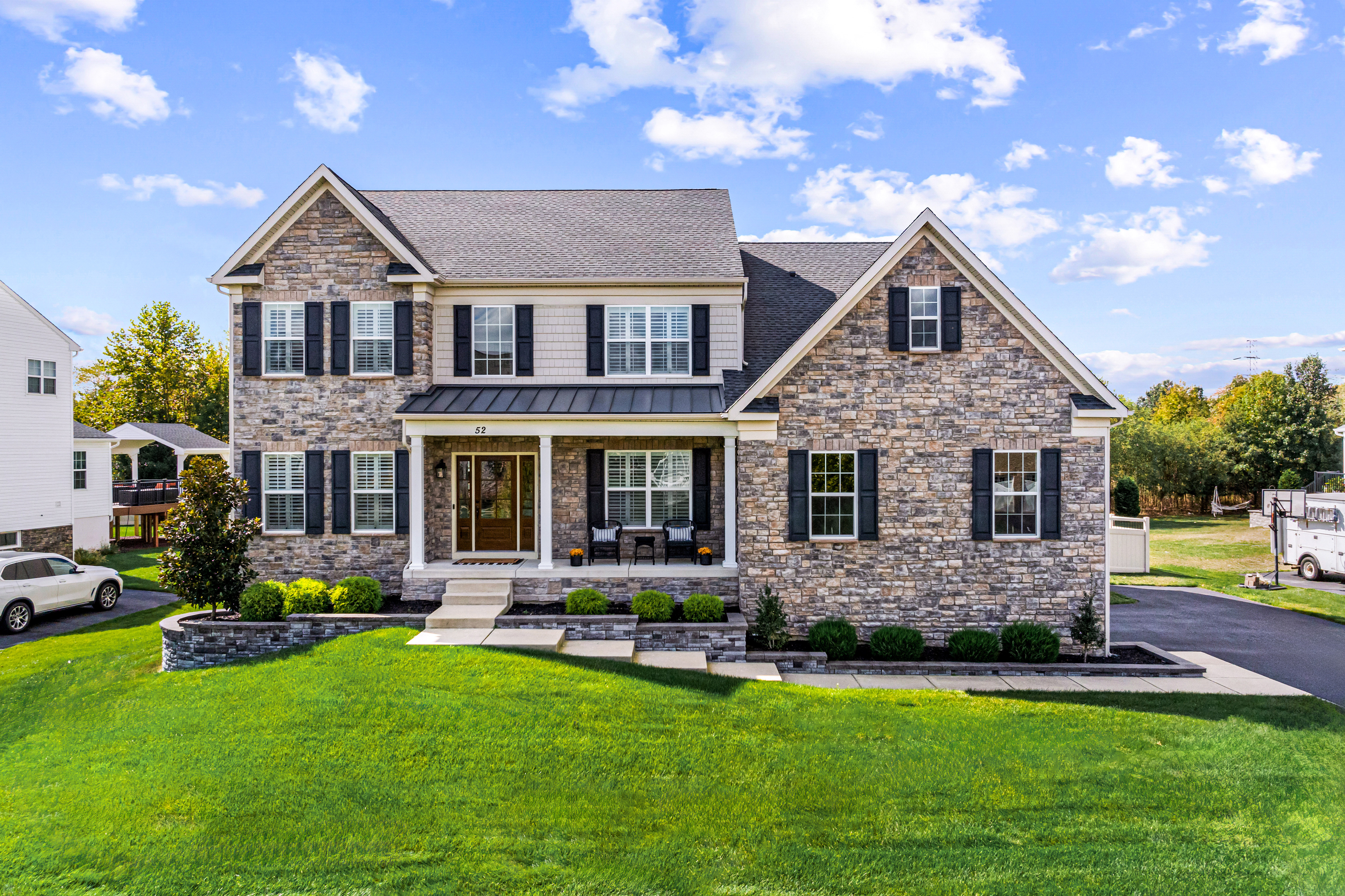 52 Wellesley Way Marlton, NJ 08053 - Photo 4 of 98 a front view of a house with garden and swimming pool
