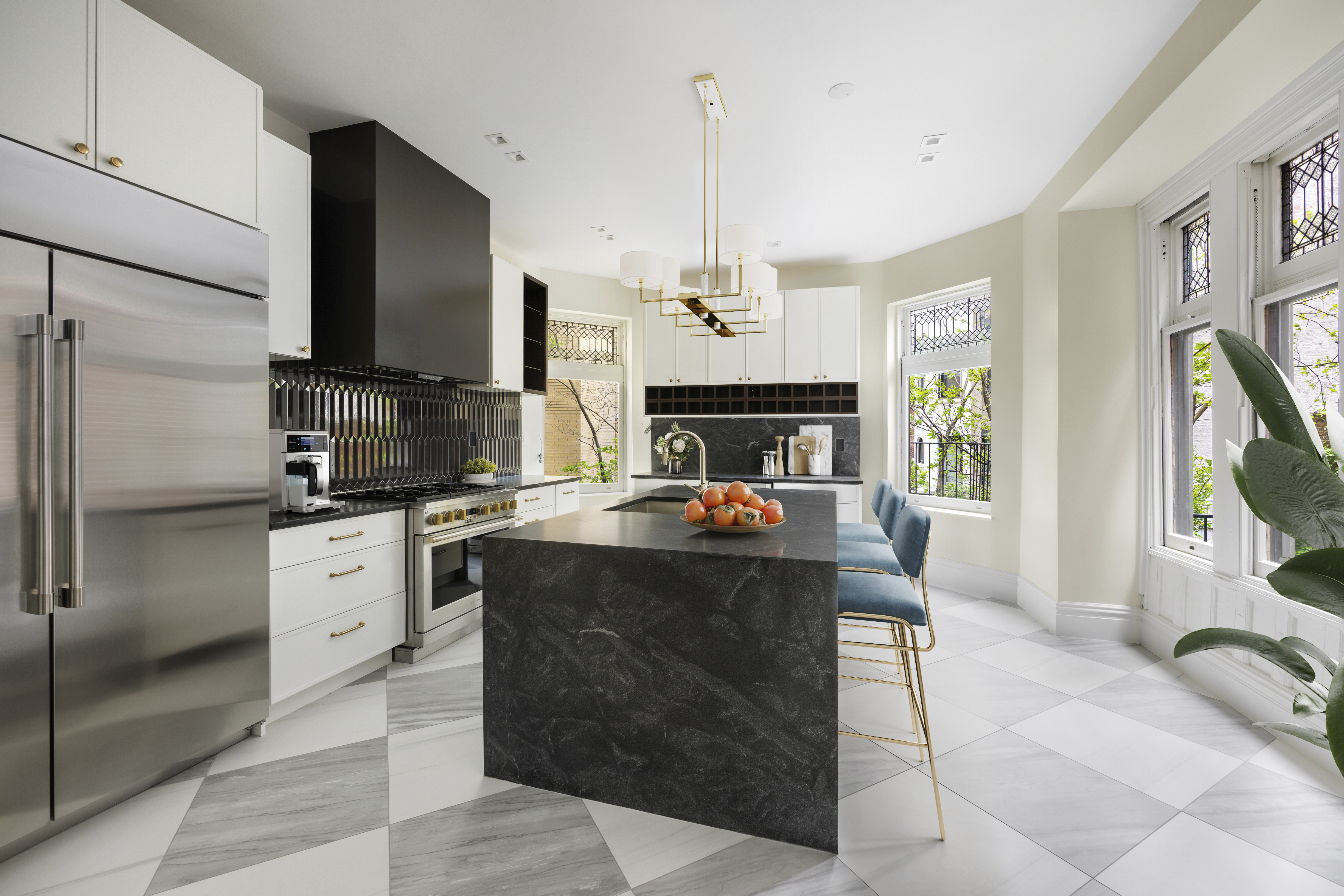 32 Prospect Park West Brooklyn, NY 11215 - Photo 7 of 21 a kitchen with stainless steel appliances granite countertop a stove a sink and a refrigerator
