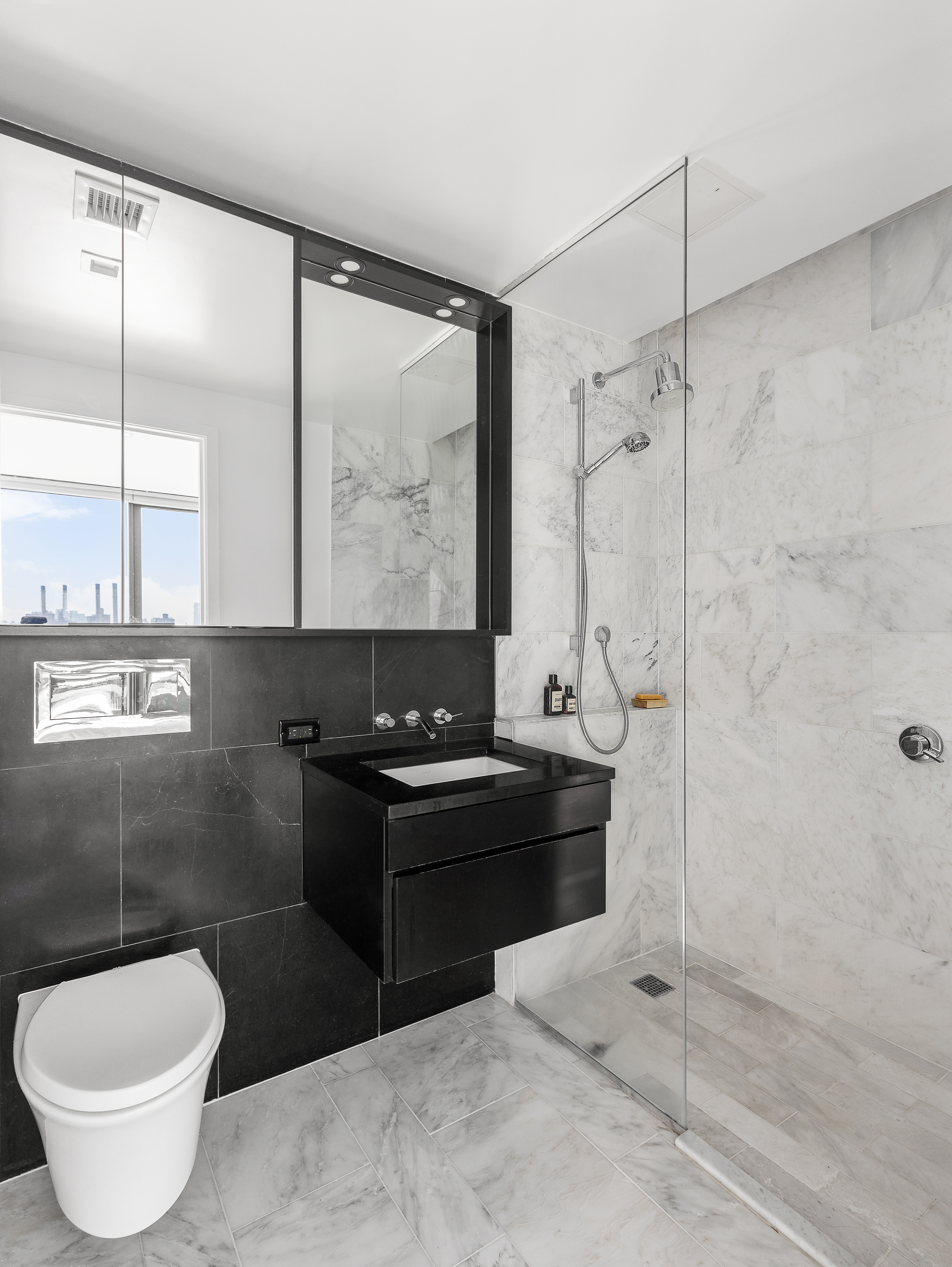 50 Greenpoint Avenue, Unit PHB Brooklyn, NY 11222 - Photo 6 of 13 a bathroom with a granite countertop sink toilet and shower